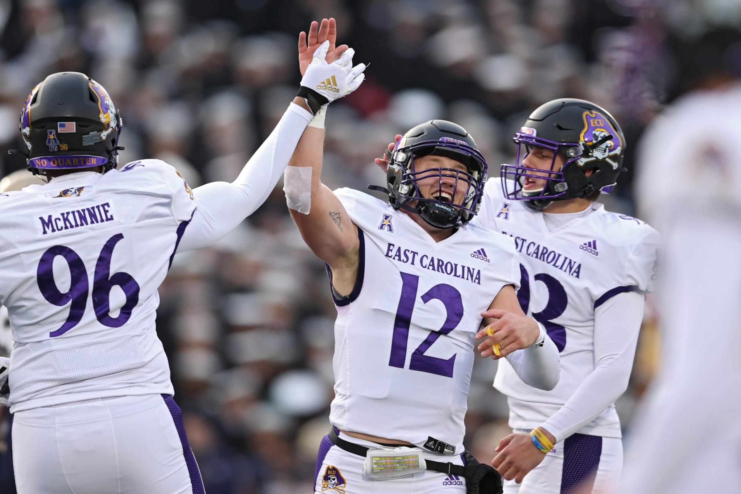 ANNAPOLIS, MARYLAND - NOVEMBER 20: Quarterback Holton Ahlers #12 of the East Carolina Pirates celebrates a touchdown against the Navy Midshipmen during the first half at Navy-Marine Corps Memorial Stadium on November 20, 2021 in Annapolis, Maryland. (Photo by Patrick Smith/Getty Images)