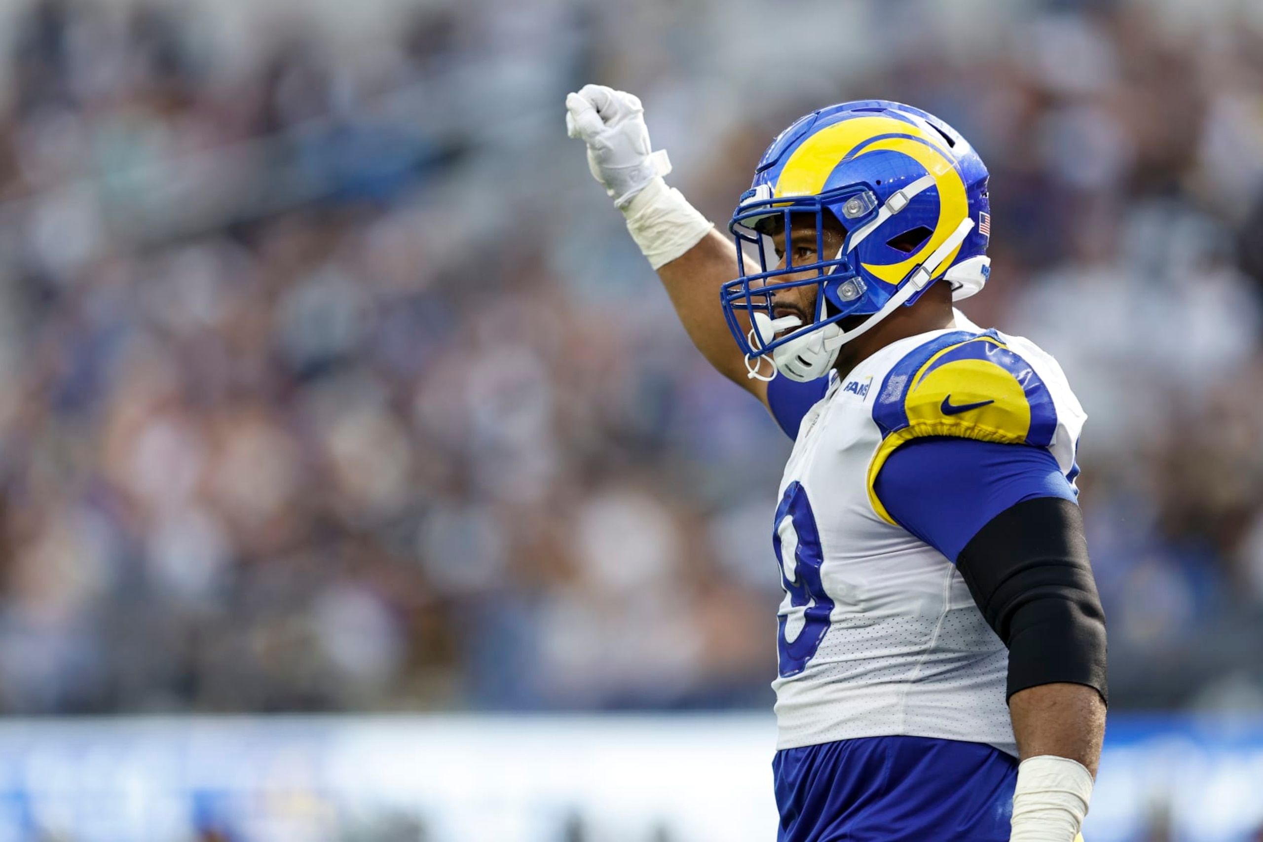 INGLEWOOD, CALIFORNIA - OCTOBER 09: Aaron Donald #99 of the Los Angeles Rams reacts during an NFL football game between the Los Angeles Rams and the Dallas Cowboys at SoFi Stadium on October 09, 2022 in Inglewood, California. (Photo by Michael Owens/Getty Images) INGLEWOOD, CALIFORNIA - OCTOBER 09: Aaron Donald #99 of the Los Angeles Rams reacts during an NFL football game between the Los Angeles Rams and the Dallas Cowboys at SoFi Stadium on October 09, 2022 in Inglewood, California. (Photo by Michael Owens/Getty Images)