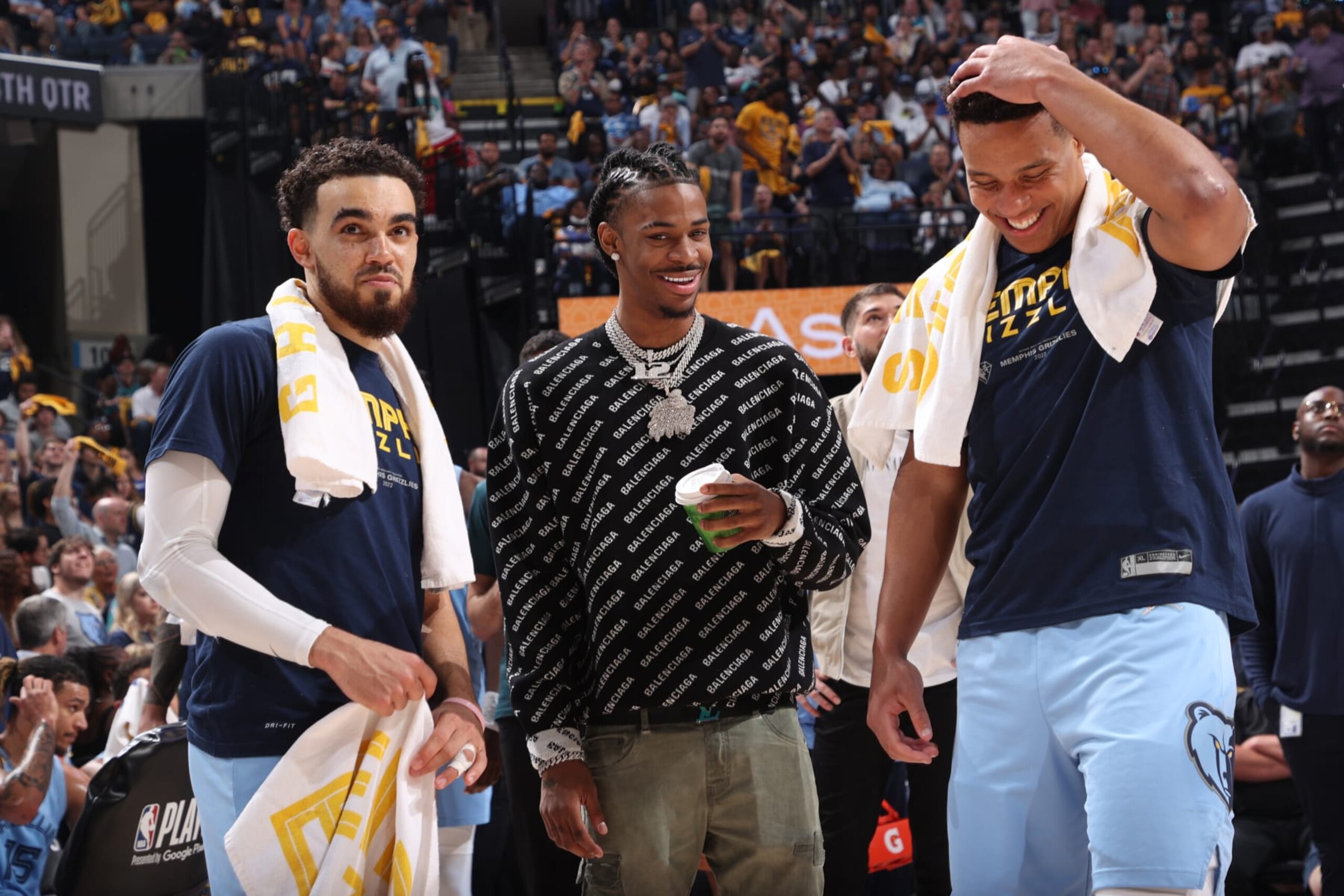 MEMPHIS, TN - MAY 11: Tyus Jones #21, Desmond Bane #22 and Ja Morant #12 of the Memphis Grizzlies smile during Game 5 of the 2022 NBA Playoffs Western Conference Semifinals on May 11, 2022 at FedExForum in Memphis, Tennessee. NOTE TO USER: User expressly acknowledges and agrees that, by downloading and or using this photograph, User is consenting to the terms and conditions of the Getty Images License Agreement. Mandatory Copyright Notice: Copyright 2022 NBAE (Photo by Joe Murphy/NBAE via Getty Images)