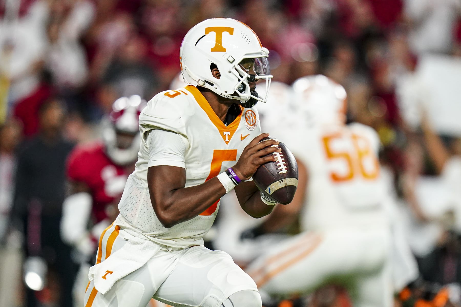 TUSCALOOSA, ALABAMA - OCTOBER 23: Hendon Hooker #5 of the Tennessee Volunteers looks to pass against Alabama Crimson Tide in the first half at Bryant Denny Stadium on October 23, 2021 in Tuscaloosa, Alabama (Photo by Marvin Gentry/Getty Images )