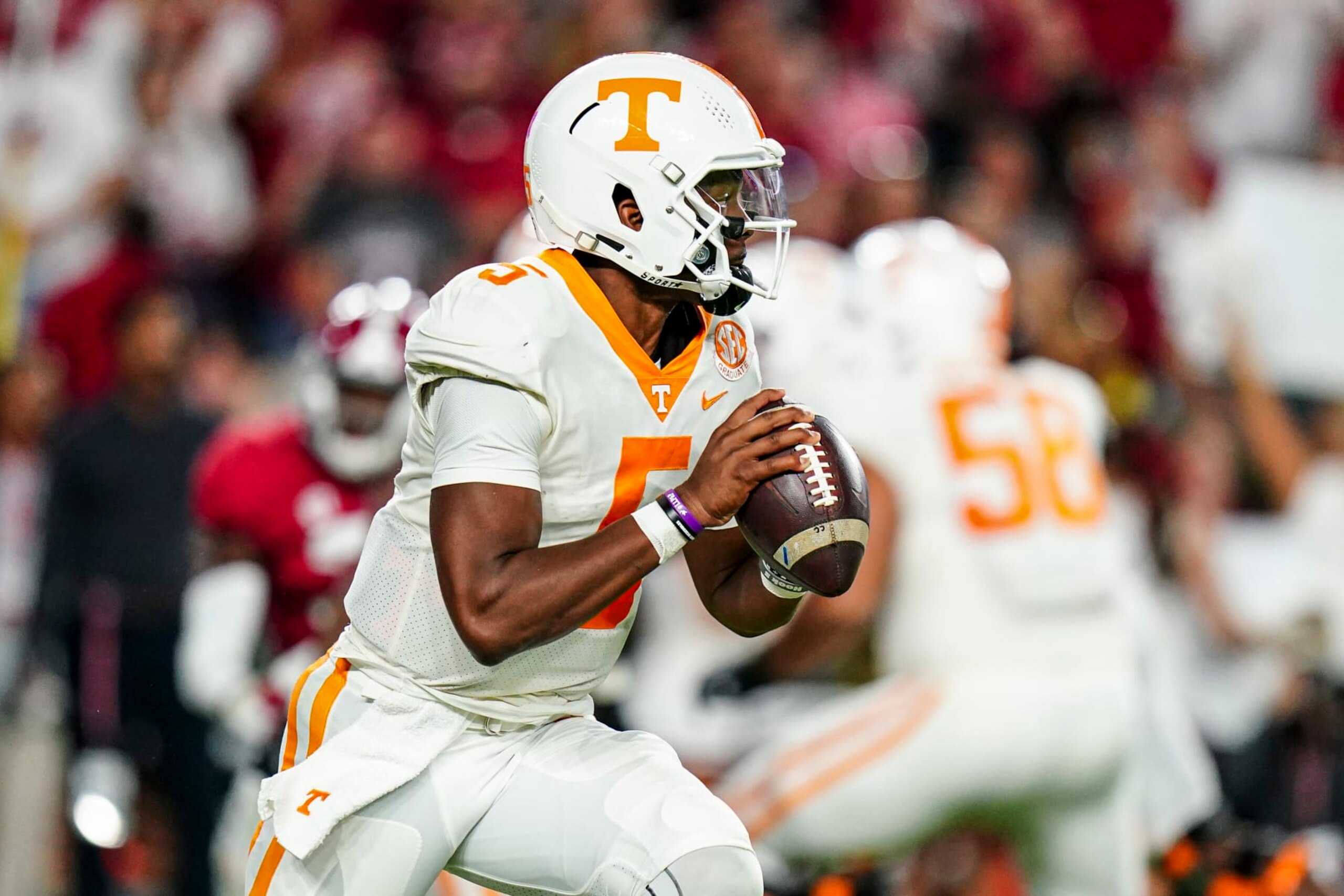 TUSCALOOSA, ALABAMA - OCTOBER 23: Hendon Hooker #5 of the Tennessee Volunteers looks to pass against Alabama Crimson Tide in the first half at Bryant Denny Stadium on October 23, 2021 in Tuscaloosa, Alabama (Photo by Marvin Gentry/Getty Images )
