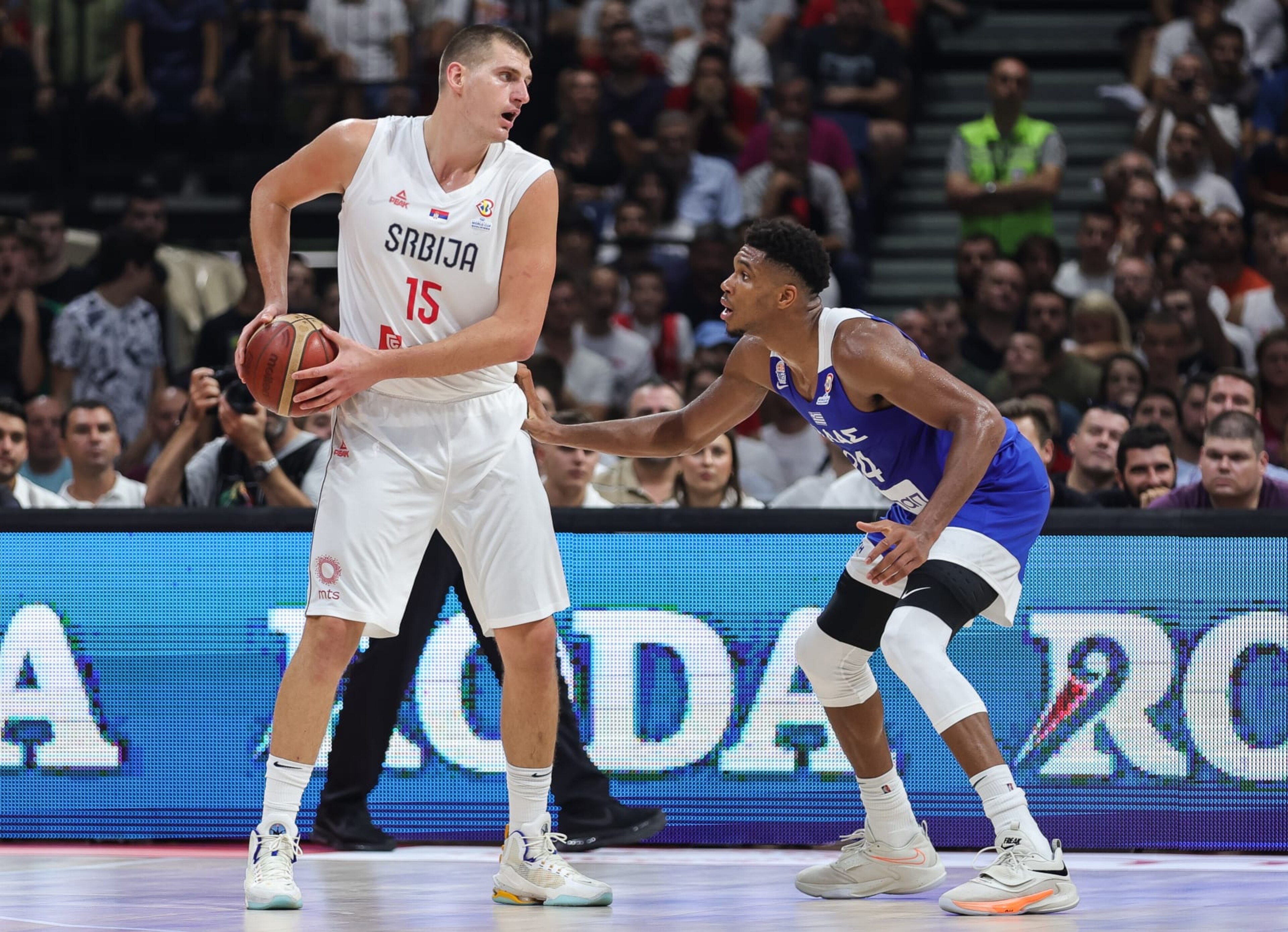 BELGRADE, SERBIA - AUGUST 25: Nikola Jokic (L) of Serbia in action against Giannis  Antetokounmpo (R) of Greece during  the FIBA Basketball World Cup 2023 Qualifier game between Serbia and Greece at Stark Arena on August 25, 2022 in Belgrade, Serbia. (Photo by Srdjan Stevanovic/Getty Images)