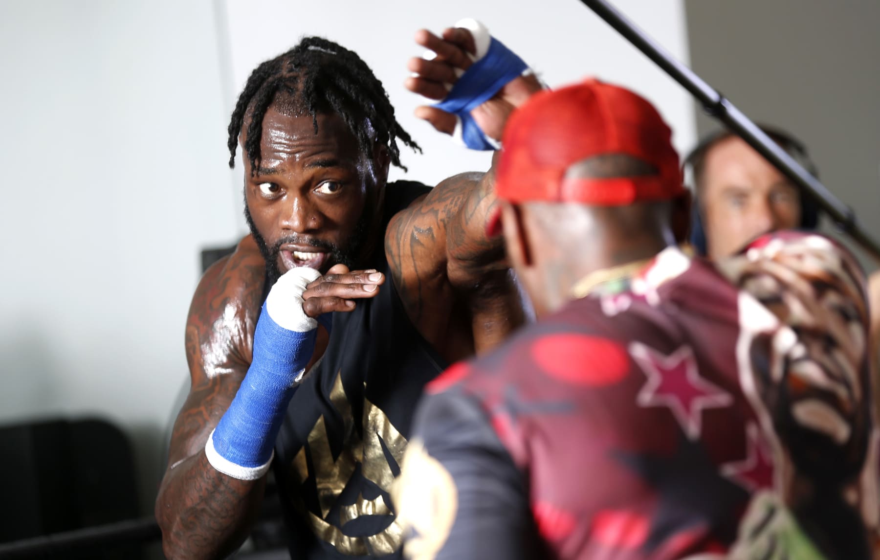 LAS VEGAS, NEVADA - SEPTEMBER 22: Heavyweight boxer Deontay Wilder (L) works on his timing with trainer Malik Scott at UFC APEX on September 22, 2022 in Las Vegas, Nevada. Wilder is scheduled to fight Robert Helenius at the Barclays Center in Brooklyn, New York on October 15.  (Photo by Steve Marcus/Getty Images)