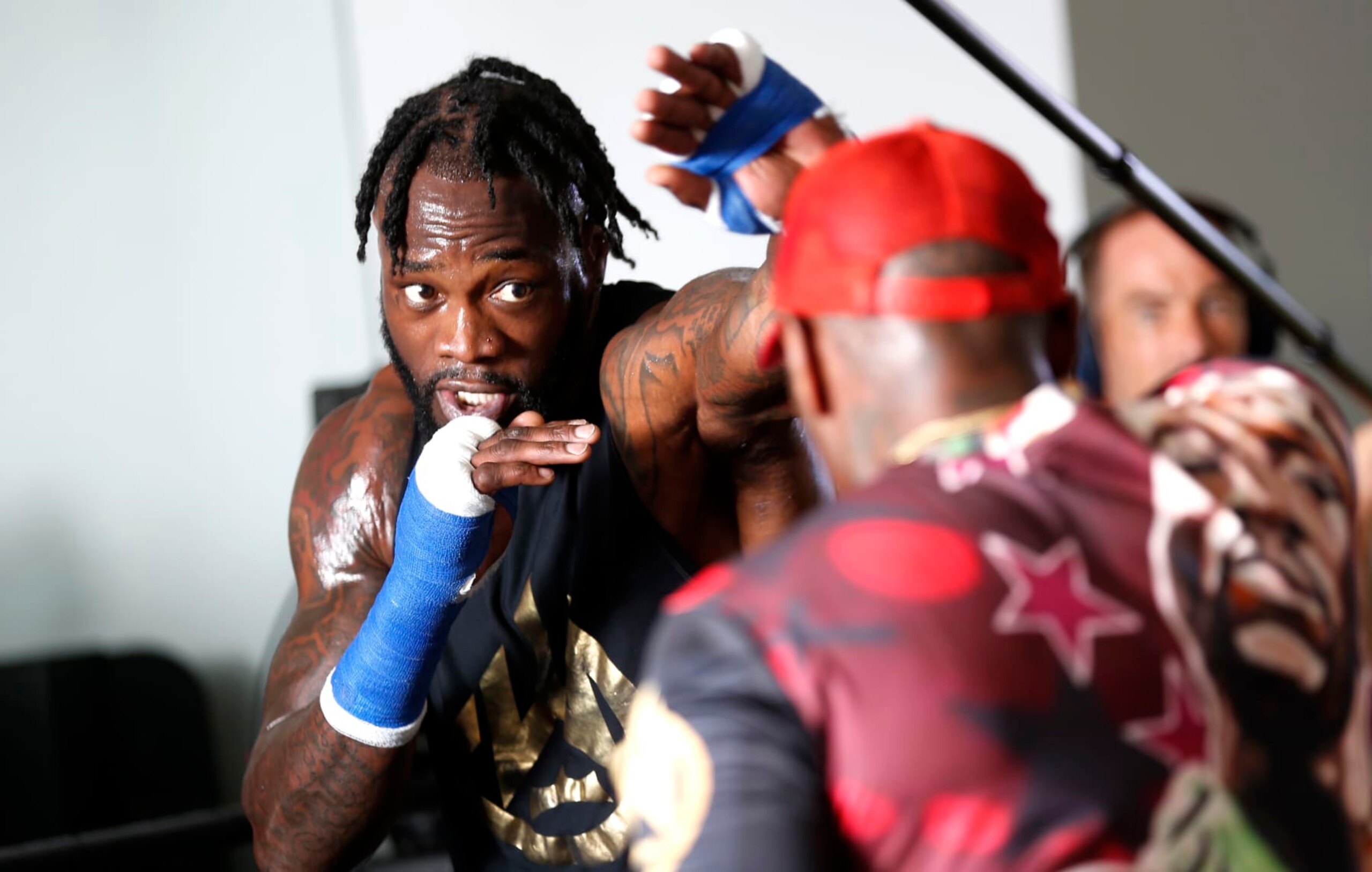 LAS VEGAS, NEVADA - SEPTEMBER 22: Heavyweight boxer Deontay Wilder (L) works on his timing with trainer Malik Scott at UFC APEX on September 22, 2022 in Las Vegas, Nevada. Wilder is scheduled to fight Robert Helenius at the Barclays Center in Brooklyn, New York on October 15.  (Photo by Steve Marcus/Getty Images)