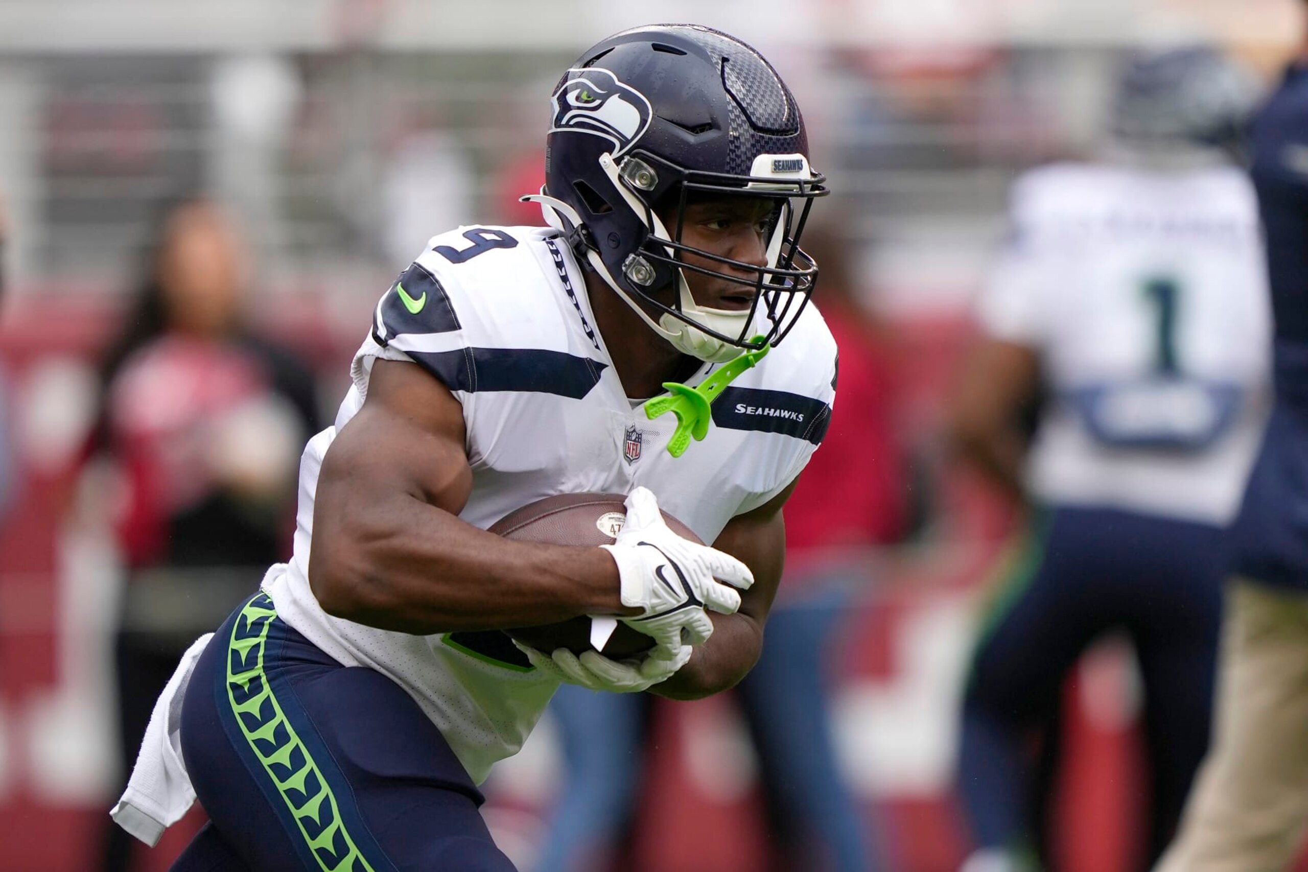 SANTA CLARA, CALIFORNIA - SEPTEMBER 18: Kenneth Walker III #9 of the Seattle Seahawks runs with the ball during warmups before the game against the San Francisco 49ers at Levi's Stadium on September 18, 2022 in Santa Clara, California. (Photo by Thearon W. Henderson/Getty Images)