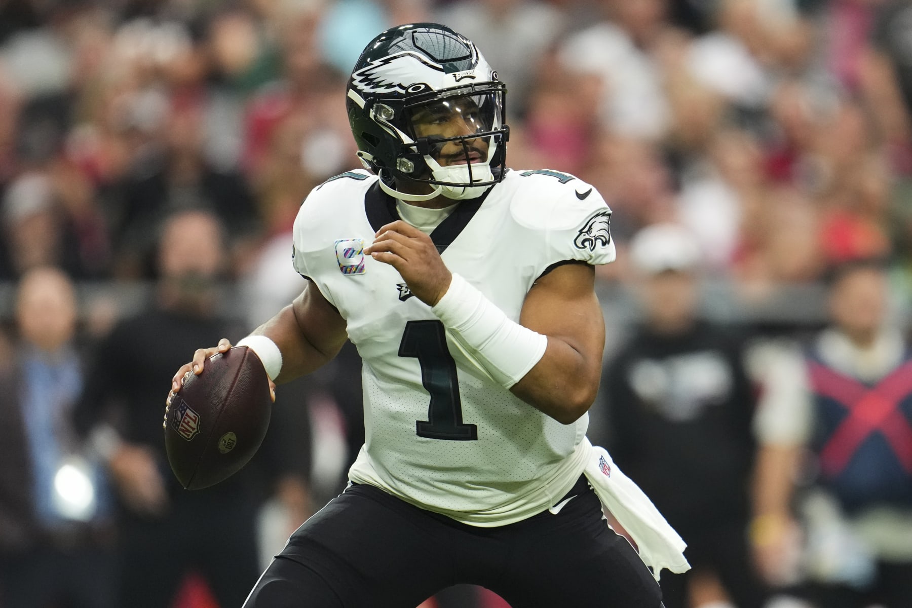 GLENDALE, AZ - OCTOBER 09: Jalen Hurts #1 of the Philadelphia Eagles drops back against the Arizona Cardinals at State Farm Stadium on October 9, 2022 in Glendale, Arizona. (Photo by Cooper Neill/Getty Images)