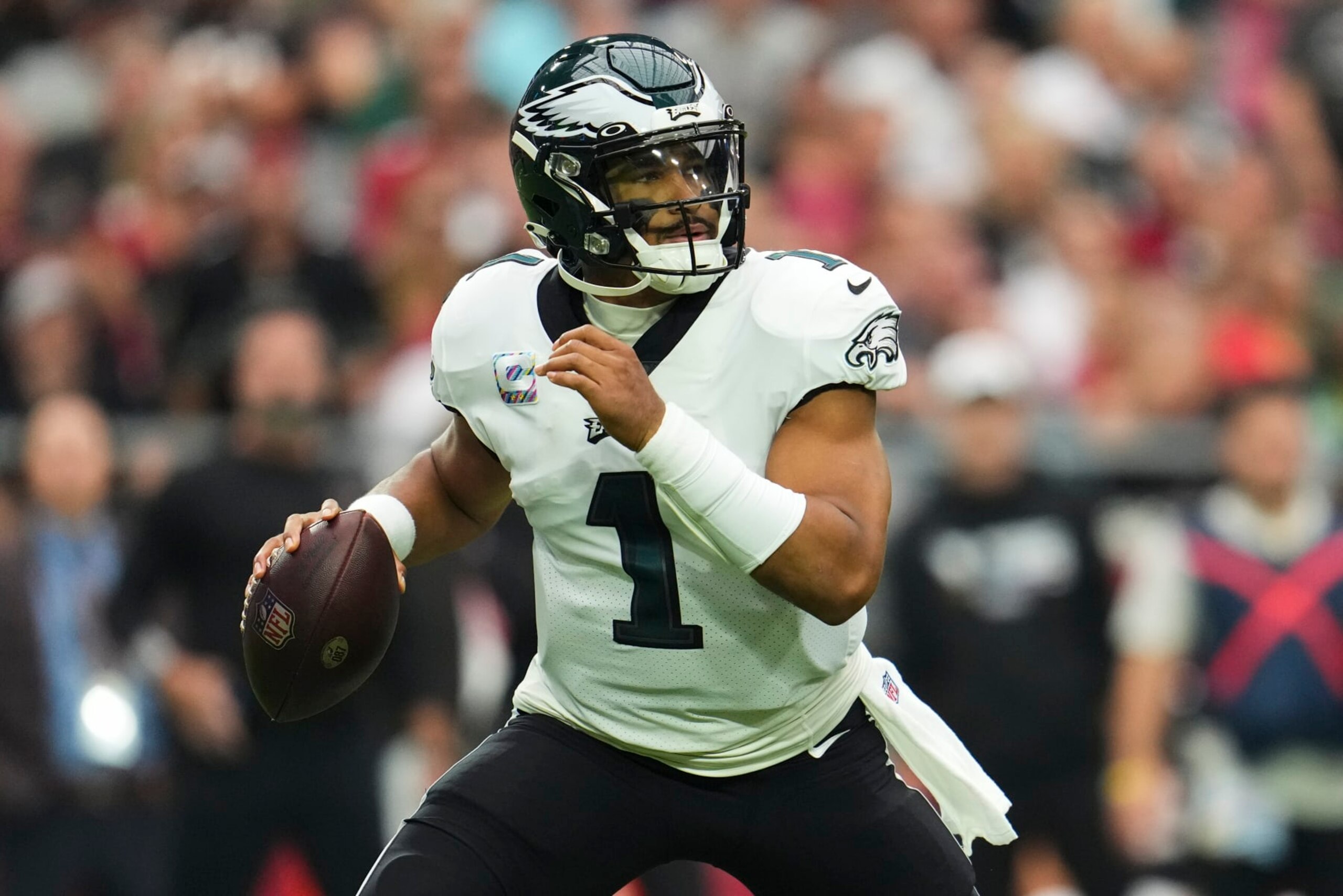 GLENDALE, AZ - OCTOBER 09: Jalen Hurts #1 of the Philadelphia Eagles drops back against the Arizona Cardinals at State Farm Stadium on October 9, 2022 in Glendale, Arizona. (Photo by Cooper Neill/Getty Images)