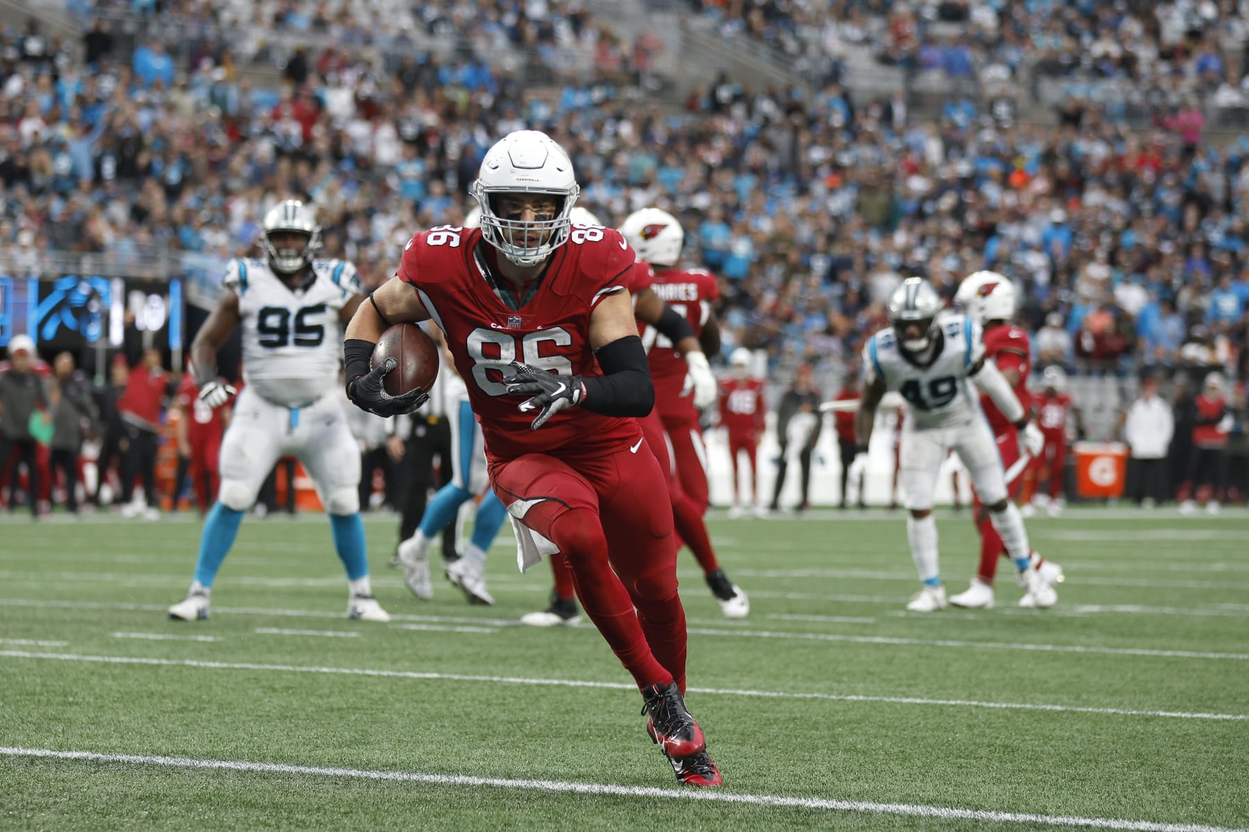 CHARLOTTE, NORTH CAROLINA - OCTOBER 02: Zach Ertz #86 of the Arizona Cardinals runs for a touchdown during the third quarter against the Carolina Panthers at Bank of America Stadium on October 02, 2022 in Charlotte, North Carolina. (Photo by Jared C. Tilton/Getty Images)