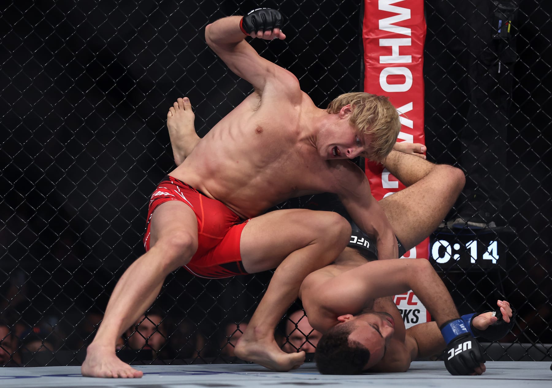 LONDON, ENGLAND - JULY 23:  Paddy Pimblett of England fights Jordan Leavitt of USA to submission in the Lightweight bout during UFC Fight Night at O2 Arena on July 23, 2022 in London, England. (Photo by Julian Finney/Getty Images)