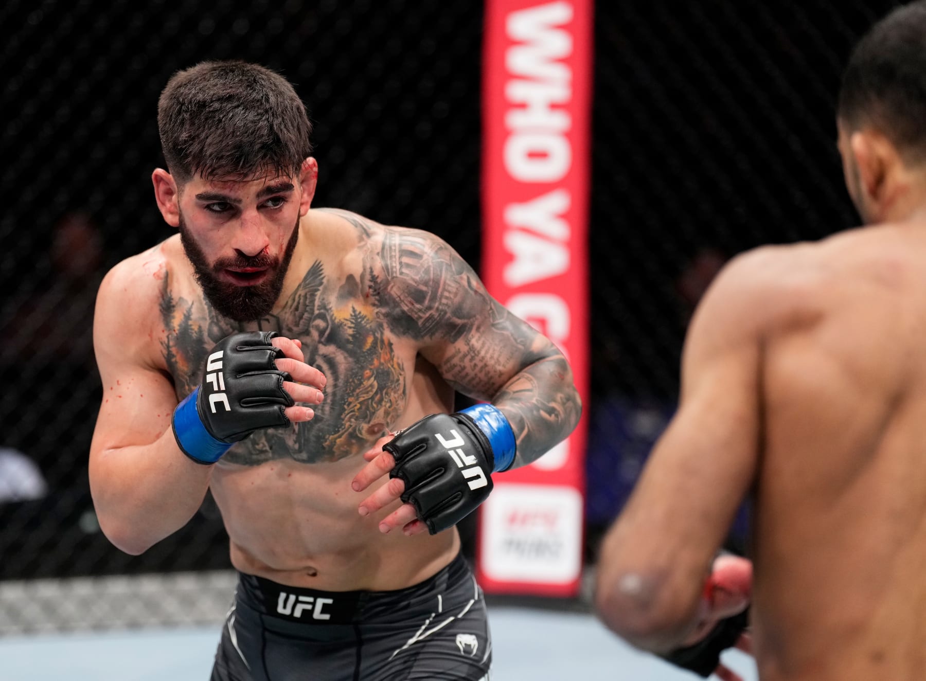 LONDON, ENGLAND - MARCH 19:  (L-R) Ilia Topuria of Spain circles Jai Herbert of England in a lightweight fight during the UFC Fight Night event at O2 Arena on March 19, 2022 in London, England. (Photo by Chris Unger/Zuffa LLC)
