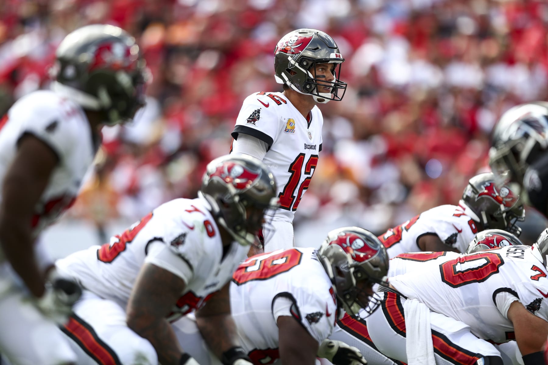 TAMPA, FL - OCTOBER 9: Tom Brady #12 of the Tampa Bay Buccaneers lines up over center before a play during an NFL football game against the Atlanta Falcons at Raymond James Stadium on October 9, 2022 in Tampa, Florida. (Photo by Kevin Sabitus/Getty Images)