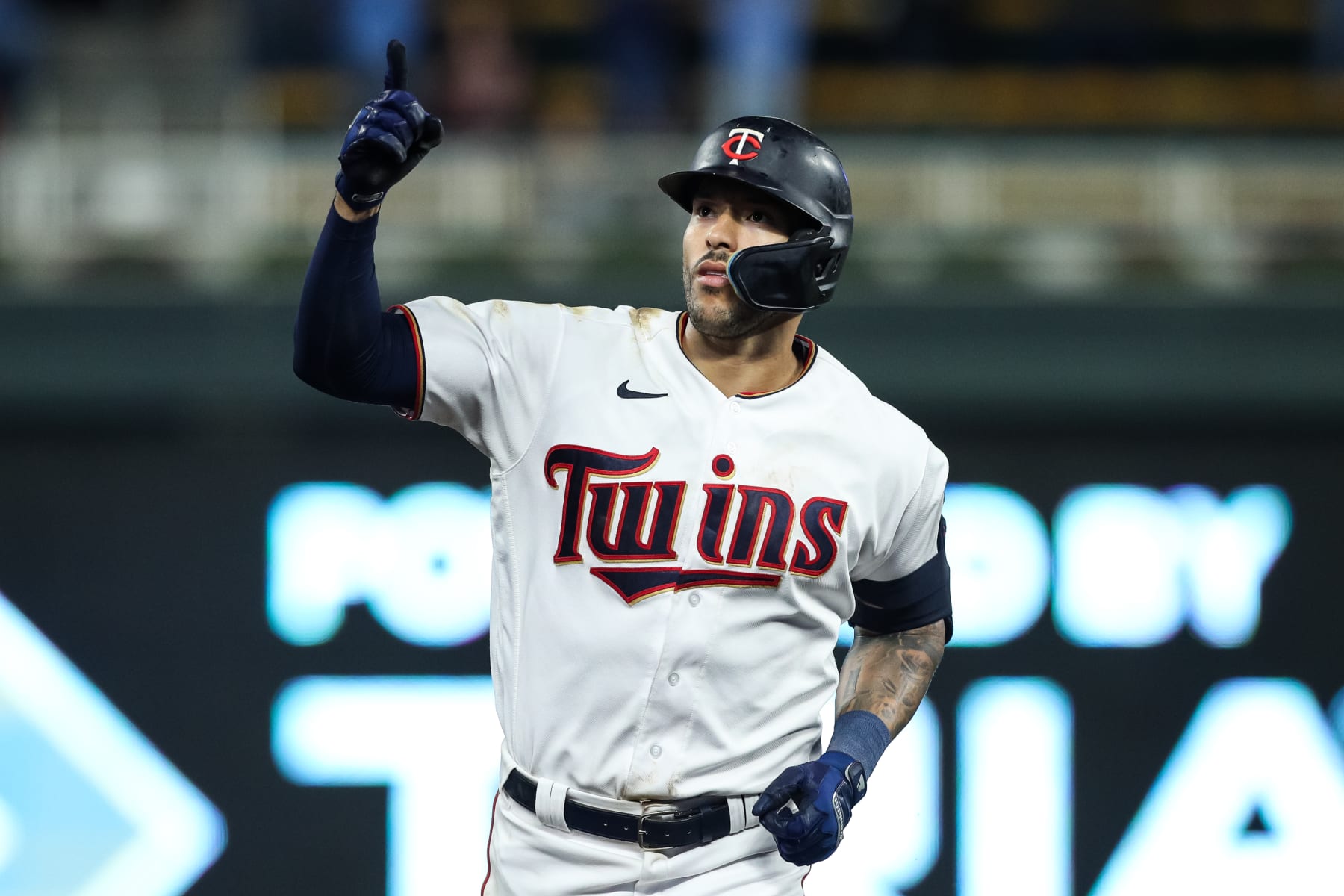 MINNEAPOLIS, MN - SEPTEMBER 09: Carlos Correa #4 of the Minnesota Twins celebrates his two-run home run as he rounds the bases against the Cleveland Guardians in the eighth inning of the game at Target Field on September 9, 2022 in Minneapolis, Minnesota. The Guardians defeated the Twins 7-6. (Photo by David Berding/Getty Images)