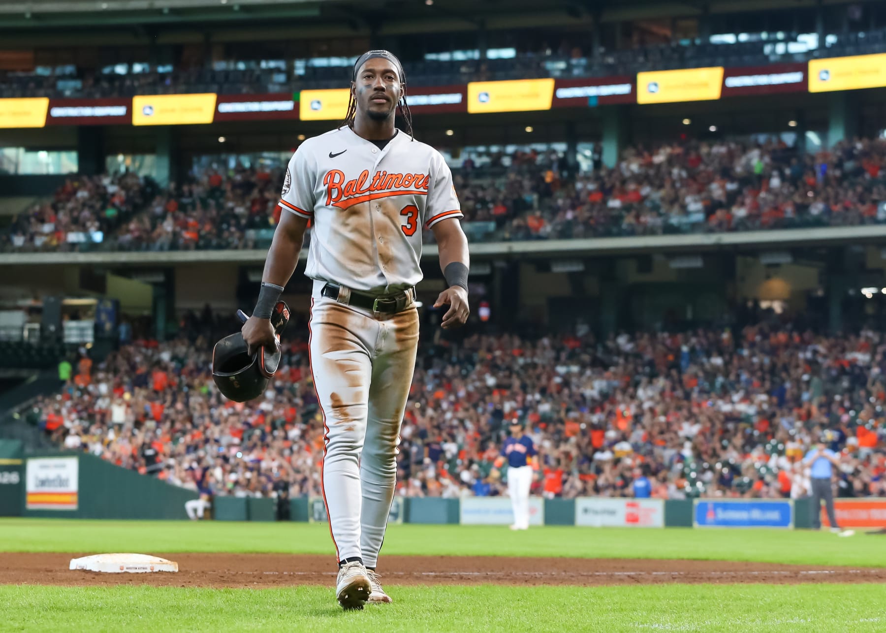 HOUSTON, TX - AUGUST 28:  Baltimore Orioles shortstop Jorge Mateo (3) returns to the dugout after getting tagged at third base in the top of the fifth inning during the MLB game between the Baltimore Orioles and Houston Astros on August 28, 2022 at Minute Maid Park in Houston, Texas.  (Photo by Leslie Plaza Johnson/Icon Sportswire via Getty Images)