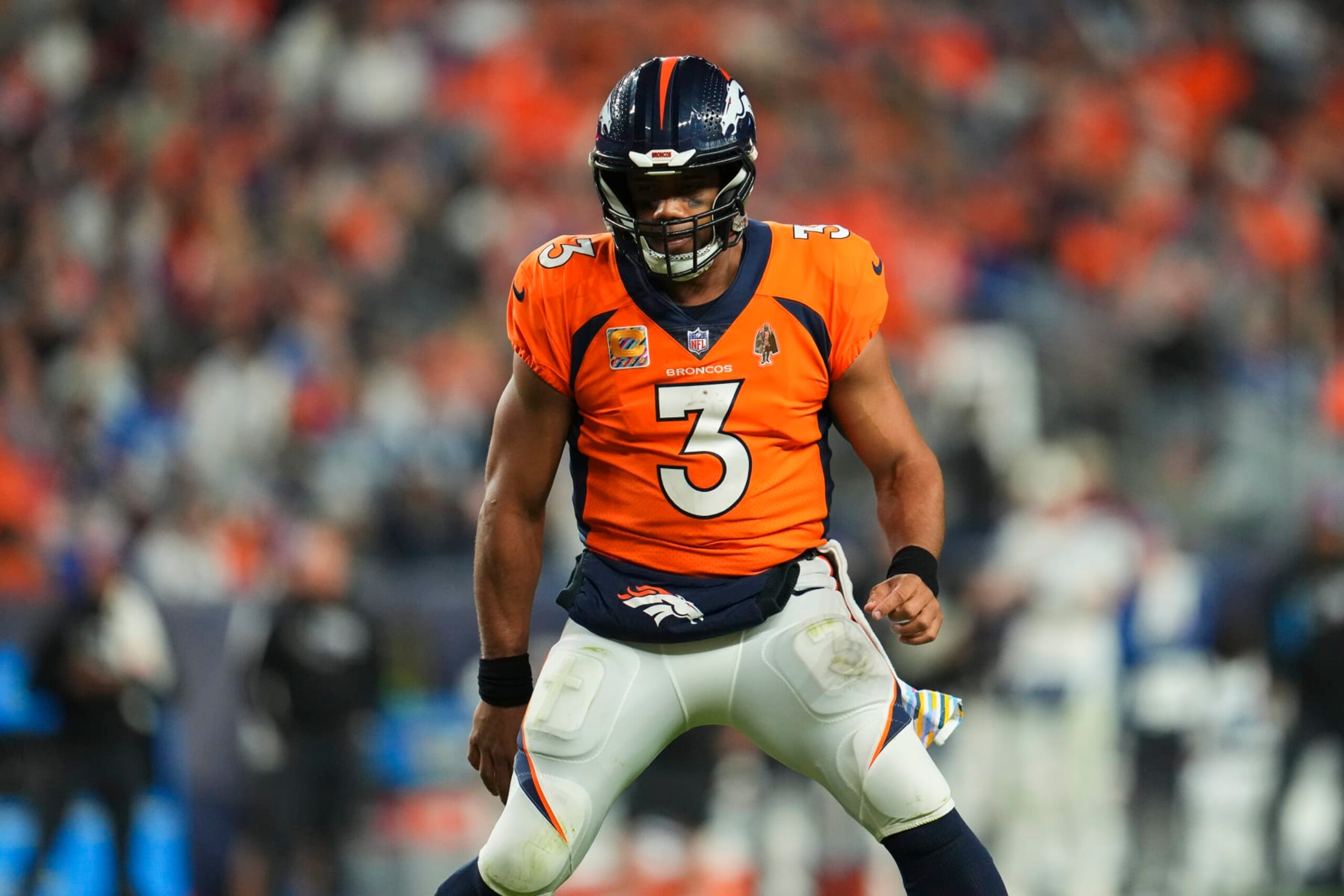 DENVER, CO - OCTOBER 06: Russell Wilson #3 of the Denver Broncos reacts after the play against the Indianapolis Colts at Empower Field at Mile High on October 6, 2022 in Denver, Texas. (Photo by Cooper Neill/Getty Images)