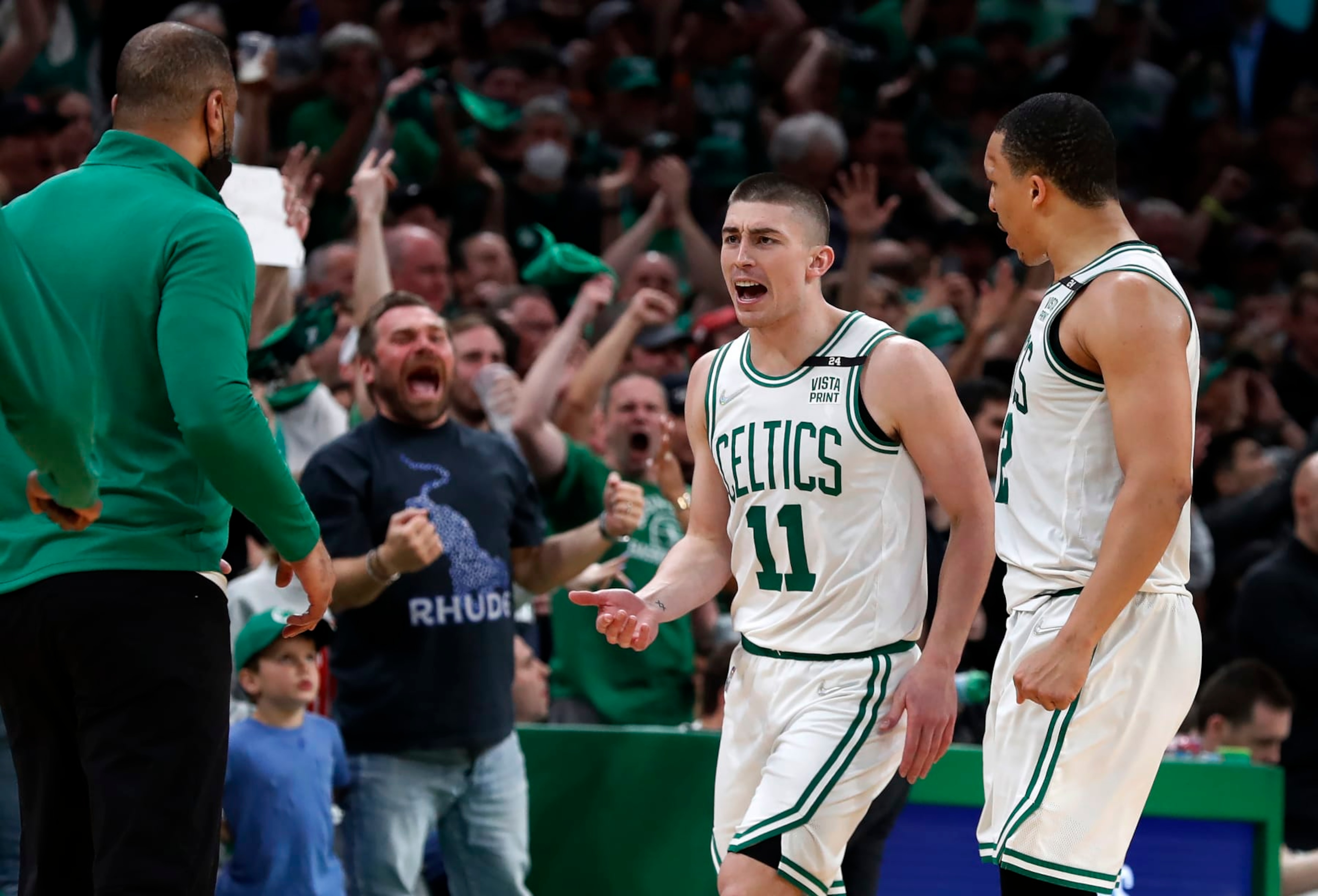 Boston - May 15: Left to right, Celtics head coach Ime Udoka, the fans, Payton Pritchard and Grant Williams celebrate one of Pritchard's three pointers. The Boston Celtics host the Milwaukee Bucks in Game 7 of the Eastern Conference semi-finals between the Celtics and Bucks on May 15, 2022 at TD Garden in Boston. (Photo by Jim Davis/The Boston Globe via Getty Images) Boston - May 15: Left to right, Celtics head coach Ime Udoka, the fans, Payton Pritchard and Grant Williams celebrate one of Pritchard's three pointers. The Boston Celtics host the Milwaukee Bucks in Game 7 of the Eastern Conference semi-finals between the Celtics and Bucks on May 15, 2022 at TD Garden in Boston. (Photo by Jim Davis/The Boston Globe via Getty Images)