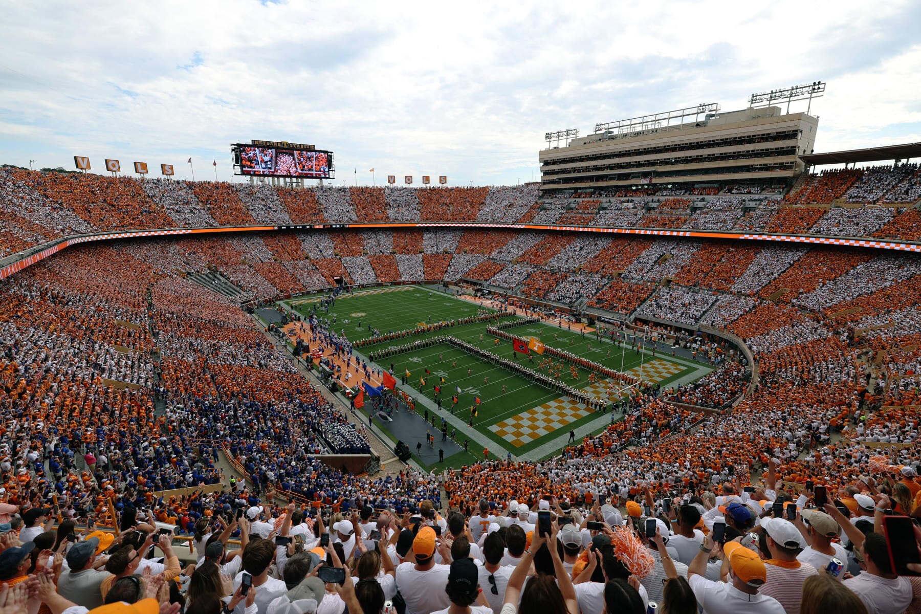 KNOXVILLE, TENNESSEE - SEPTEMBER 24: General view of the Tennessee Volunteers team running through the 'T' before the game against the Florida Gators at Neyland Stadium on September 24, 2022 in Knoxville, Tennessee. Tennessee won the game 38-33. (Photo by Donald Page/Getty Images)