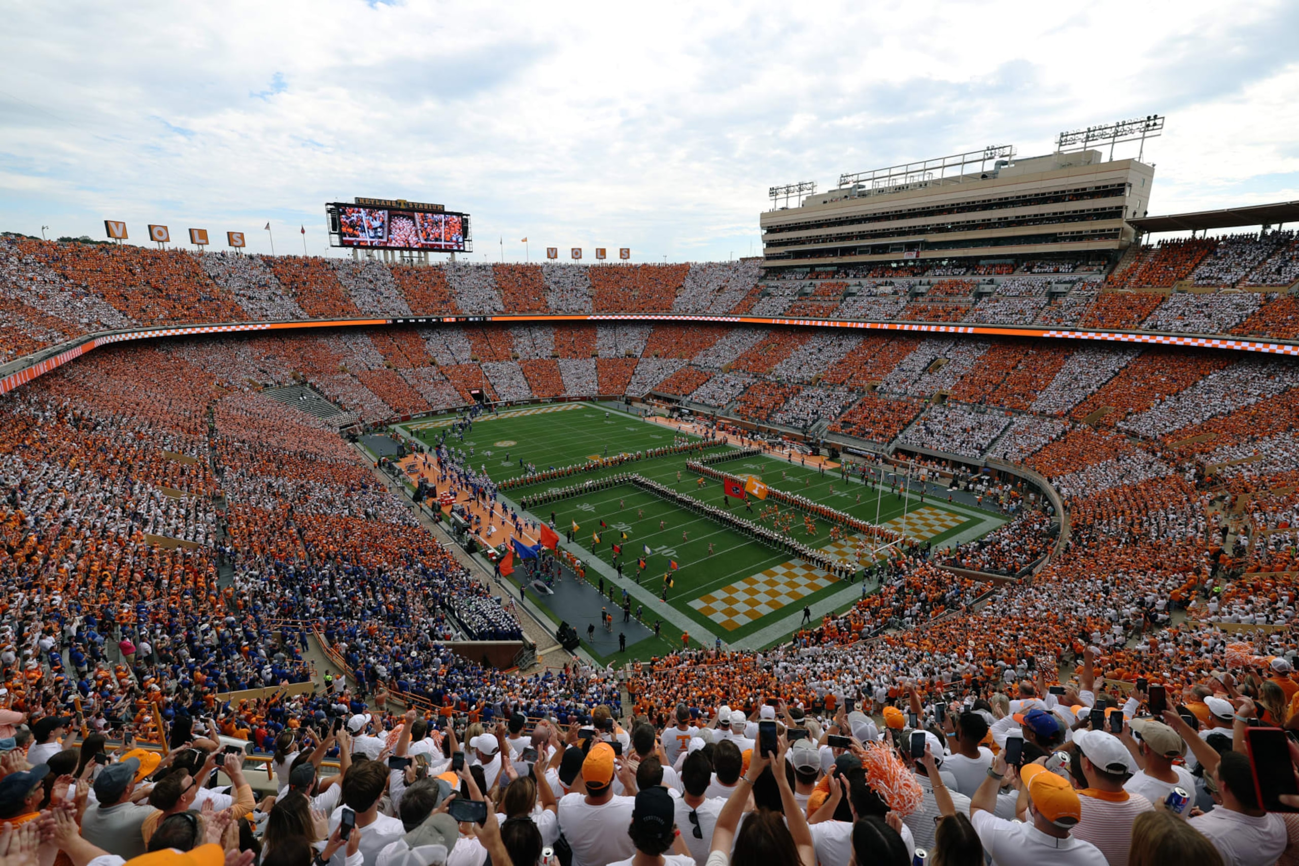 KNOXVILLE, TENNESSEE - SEPTEMBER 24: General view of the Tennessee Volunteers team running through the 'T' before the game against the Florida Gators at Neyland Stadium on September 24, 2022 in Knoxville, Tennessee. Tennessee won the game 38-33. (Photo by Donald Page/Getty Images)