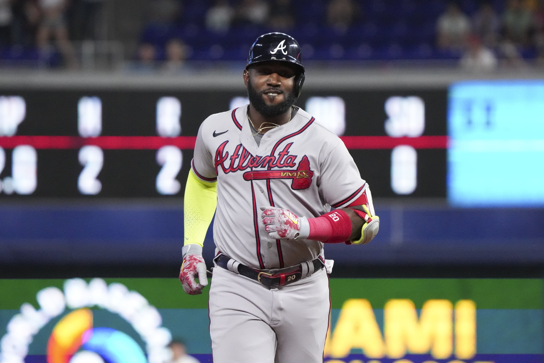 MIAMI, FLORIDA - OCTOBER 05: Marcell Ozuna #20 of the Atlanta Braves rounds second base after hitting a home run in the sixth inning against the Miami Marlins at loanDepot park on October 05, 2022 in Miami, Florida. (Photo by Eric Espada/Getty Images)