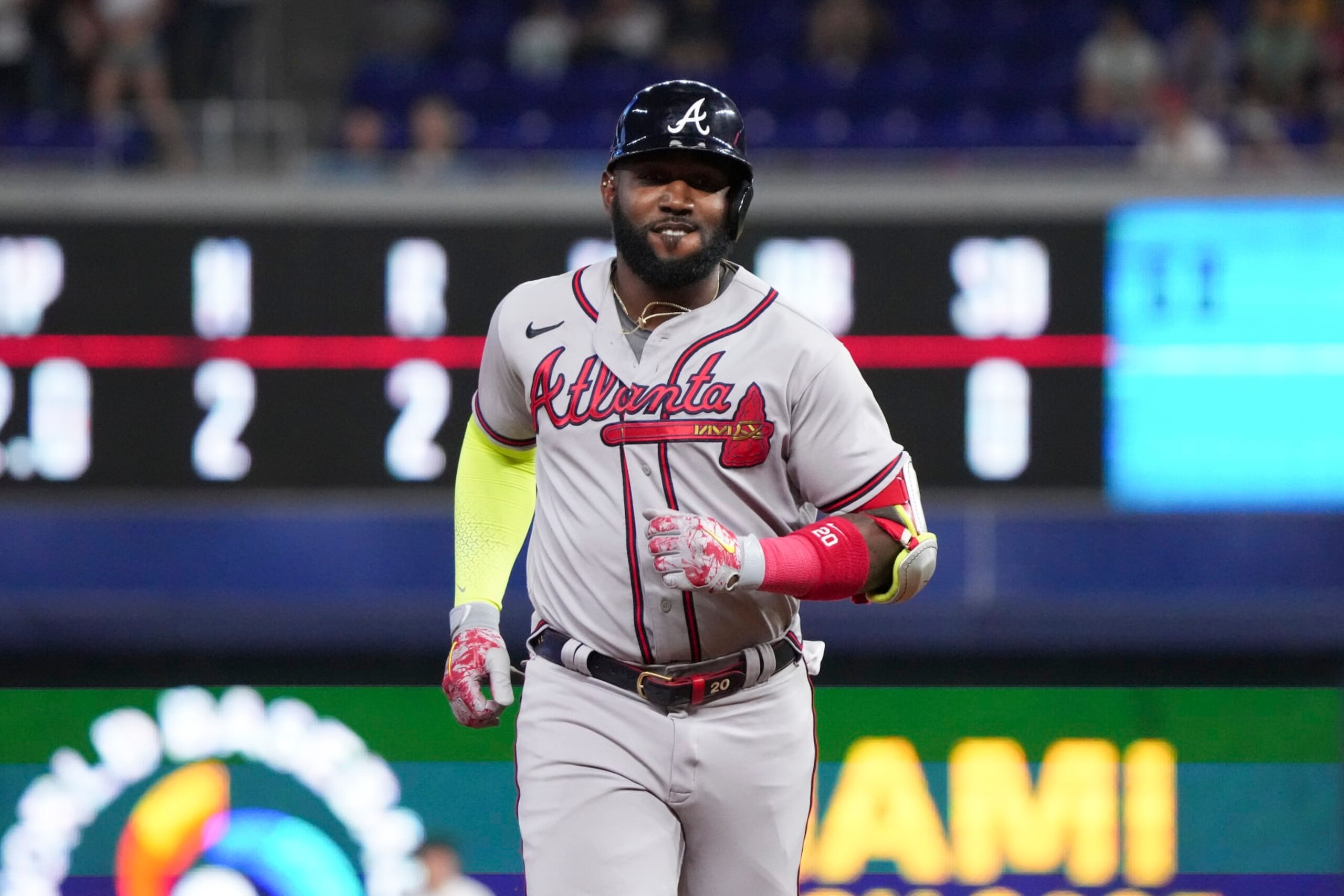 MIAMI, FLORIDA - OCTOBER 05: Marcell Ozuna #20 of the Atlanta Braves rounds second base after hitting a home run in the sixth inning against the Miami Marlins at loanDepot park on October 05, 2022 in Miami, Florida. (Photo by Eric Espada/Getty Images)