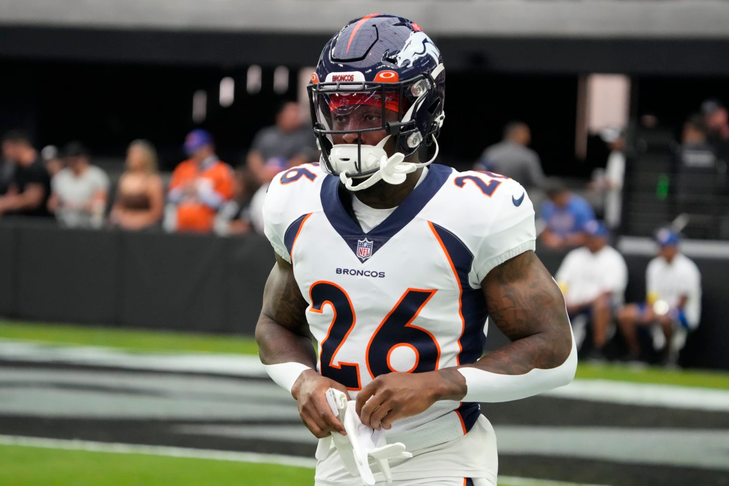 Denver Broncos running back Mike Boone (26) during the first half of an NFL football game against the Las Vegas Raiders, Sunday, Oct 2, 2022, in Las Vegas. (AP Photo/Rick Scuteri)