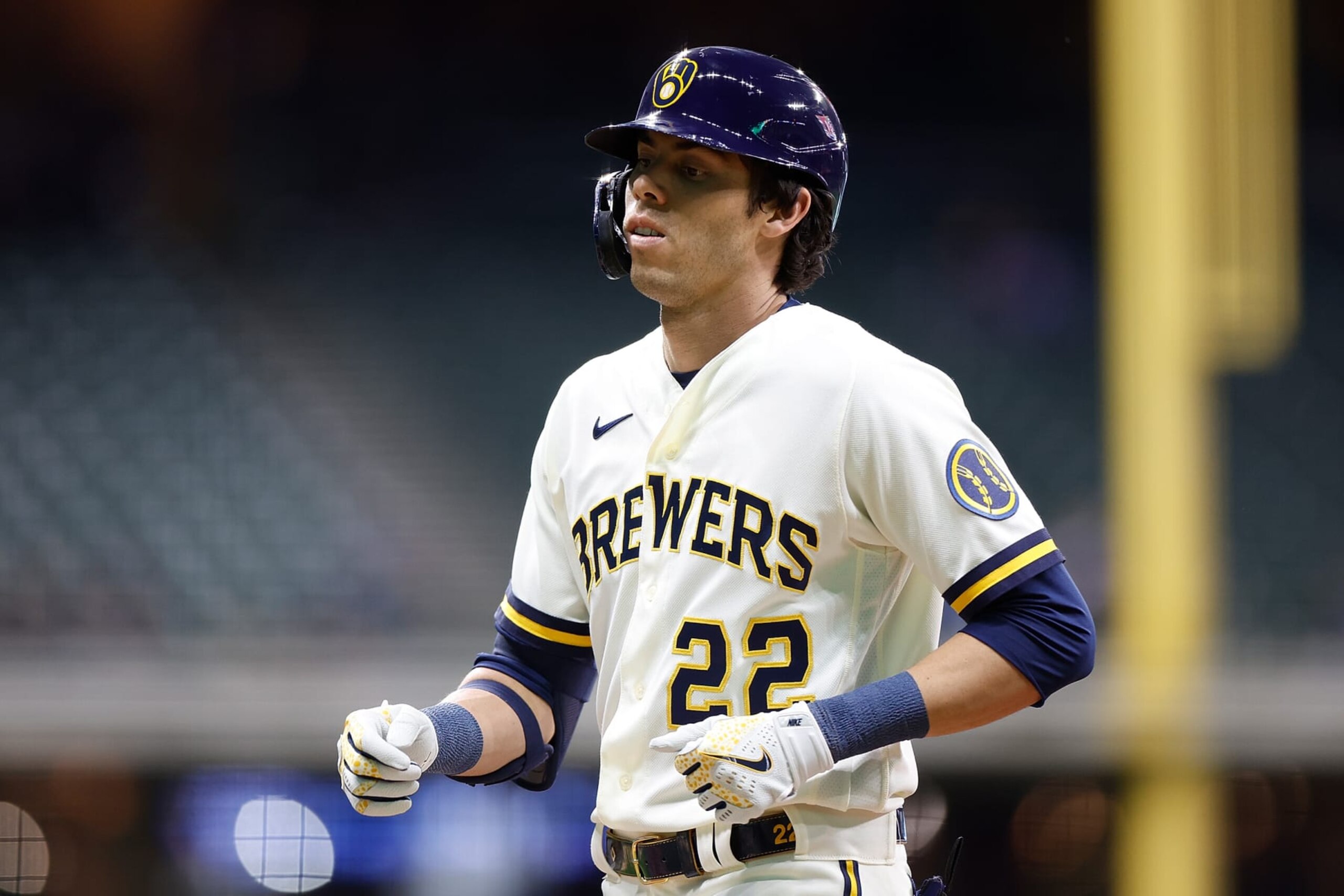 MILWAUKEE, WISCONSIN - SEPTEMBER 29: Christian Yelich #22 of the Milwaukee Brewers after a base hit against the Miami Marlins at American Family Field on September 29, 2022 in Milwaukee, Wisconsin. (Photo by John Fisher/Getty Images)