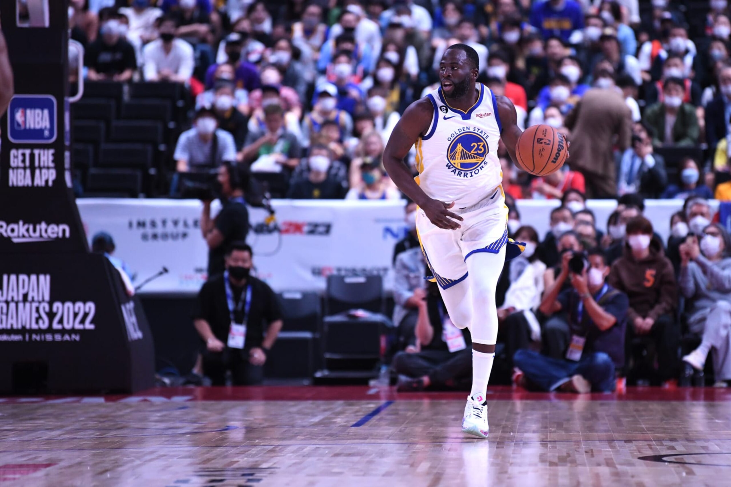 SAITAMA, JAPAN - SEPTEMBER 30: Draymond Green #23 of the Golden State Warriors dribbles the ball during the game against the Washington Wizards as part of the 2022 NBA Japan Games on September 30, 2022 at Saitama Super Arena in Saitama, Japan . NOTE TO USER: User expressly acknowledges and agrees that, by downloading and or using this Photograph, user is consenting to the terms and conditions of the Getty Images License Agreement. Mandatory Copyright Notice: Copyright 2022 NBAE (Photo by Noah Graham/NBAE via Getty Images)