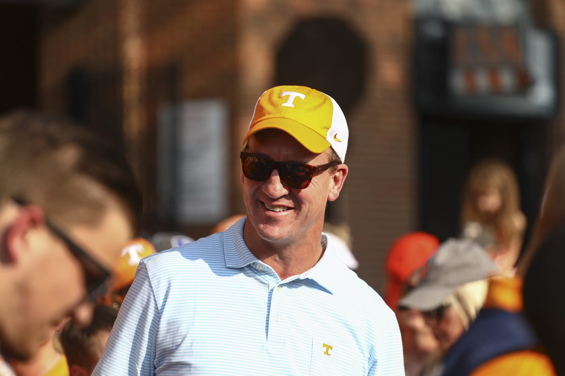 KNOXVILLE, TENNESSEE - OCTOBER 05: Tennessee Volunteers alumnus Peyton Manning talks with fans before the Tennessee Volunteers play against the Georgia Bulldogs at Neyland Stadium on October 05, 2019 in Knoxville, Tennessee. (Photo by Silas Walker/Getty Images)