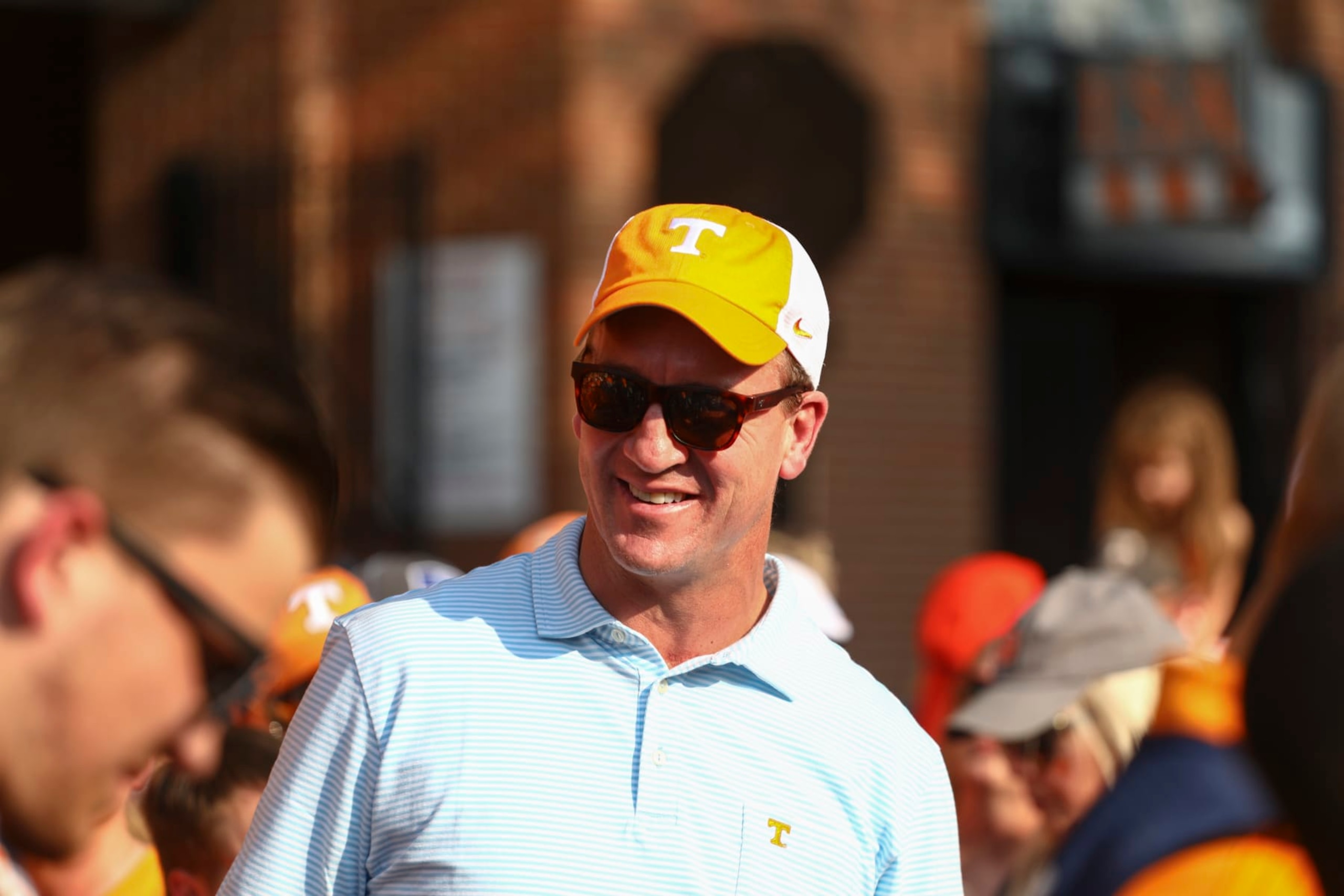 KNOXVILLE, TENNESSEE - OCTOBER 05: Tennessee Volunteers alumnus Peyton Manning talks with fans before the Tennessee Volunteers play against the Georgia Bulldogs at Neyland Stadium on October 05, 2019 in Knoxville, Tennessee. (Photo by Silas Walker/Getty Images)