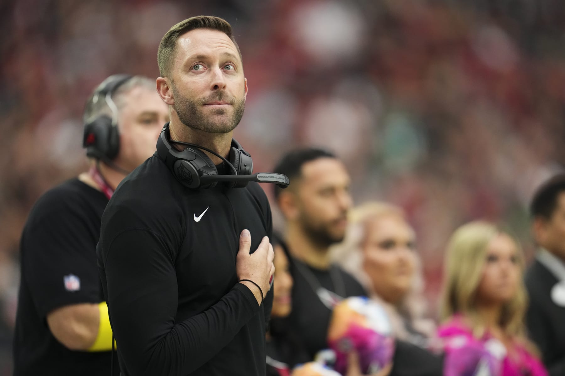 GLENDALE, AZ - OCTOBER 09: head coach Kliff Kingsbury of the Arizona Cardinals stands during the national anthem against the Philadelphia Eagles at State Farm Stadium on October 9, 2022 in Glendale, Arizona. (Photo by Cooper Neill/Getty Images)