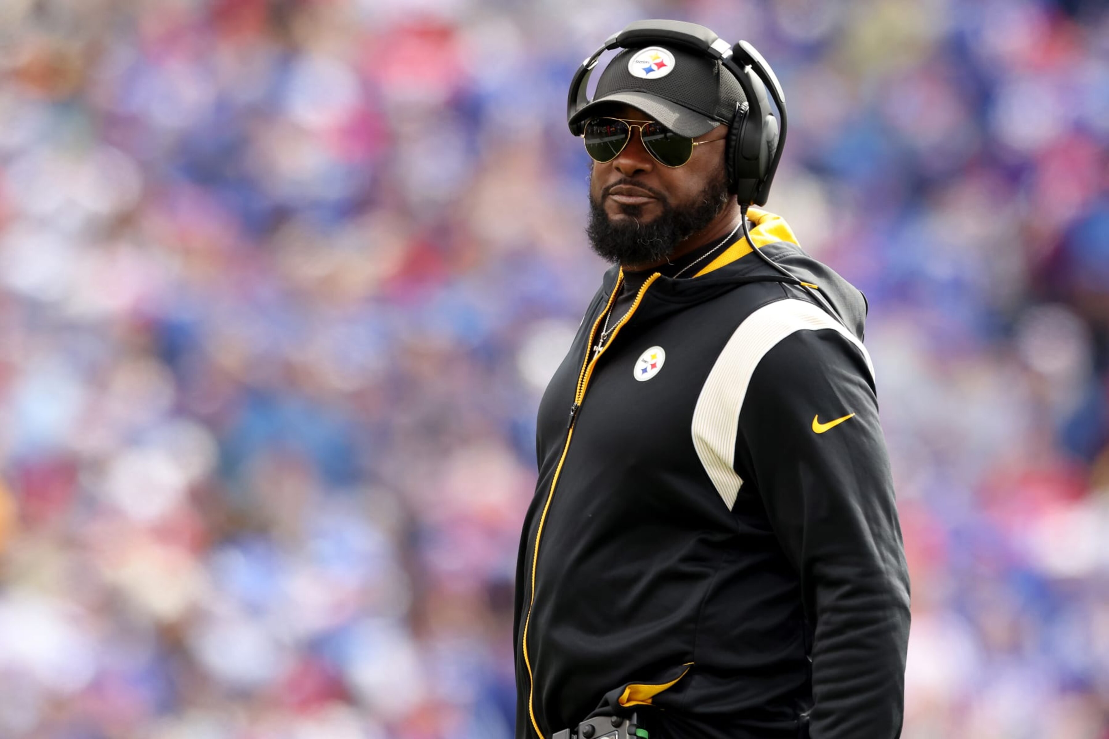 ORCHARD PARK, NEW YORK - OCTOBER 09: Head Coach Mike Tomlin of the Pittsburgh Steelers looks on during the first quarter against the Buffalo Bills at Highmark Stadium on October 09, 2022 in Orchard Park, New York. (Photo by Bryan Bennett/Getty Images) ORCHARD PARK, NEW YORK - OCTOBER 09: Head Coach Mike Tomlin of the Pittsburgh Steelers looks on during the first quarter against the Buffalo Bills at Highmark Stadium on October 09, 2022 in Orchard Park, New York. (Photo by Bryan Bennett/Getty Images)
