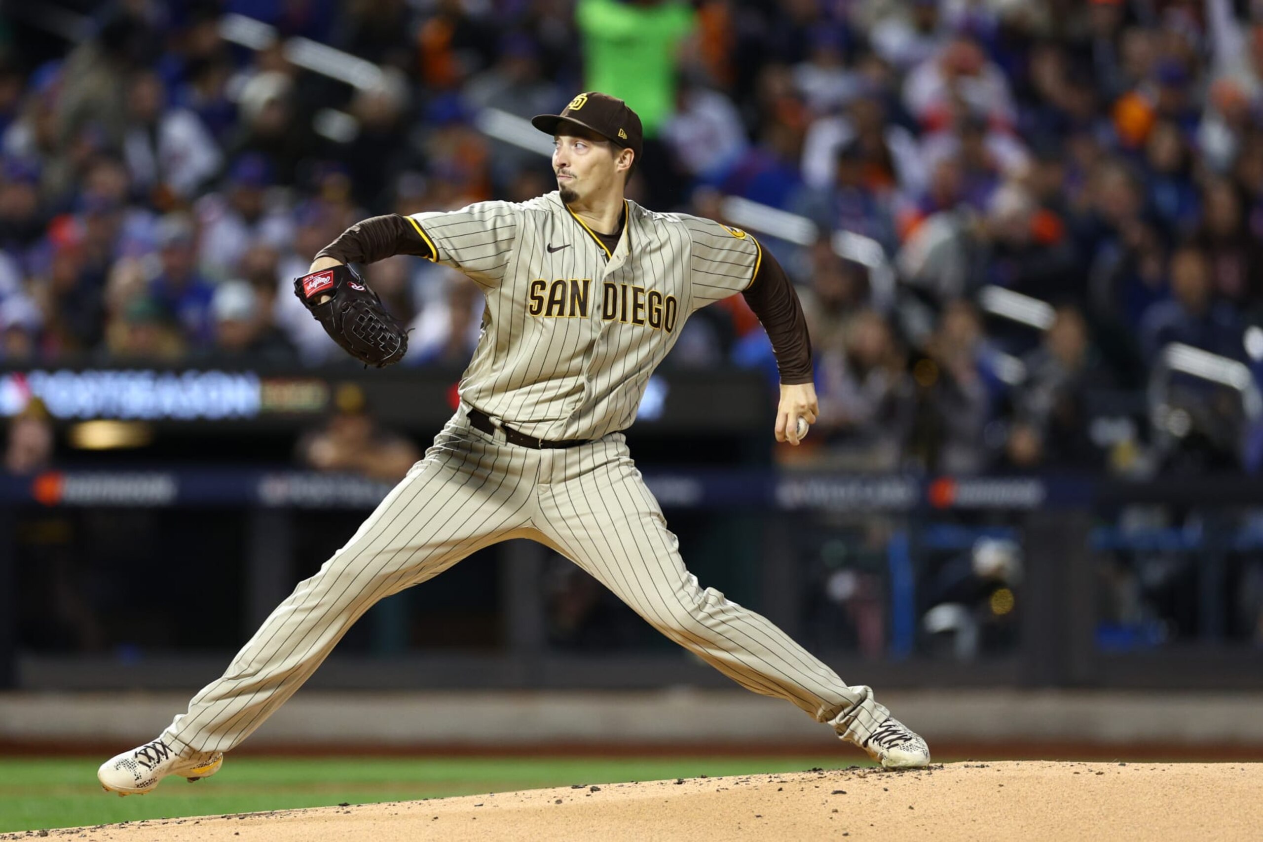 NEW YORK, NEW YORK - OCTOBER 08: Blake Snell #4 of the San Diego Padres delivers during the first inning against the New York Mets in game two of the Wild Card Series at Citi Field on October 08, 2022 in New York City. (Photo by Elsa/Getty Images)