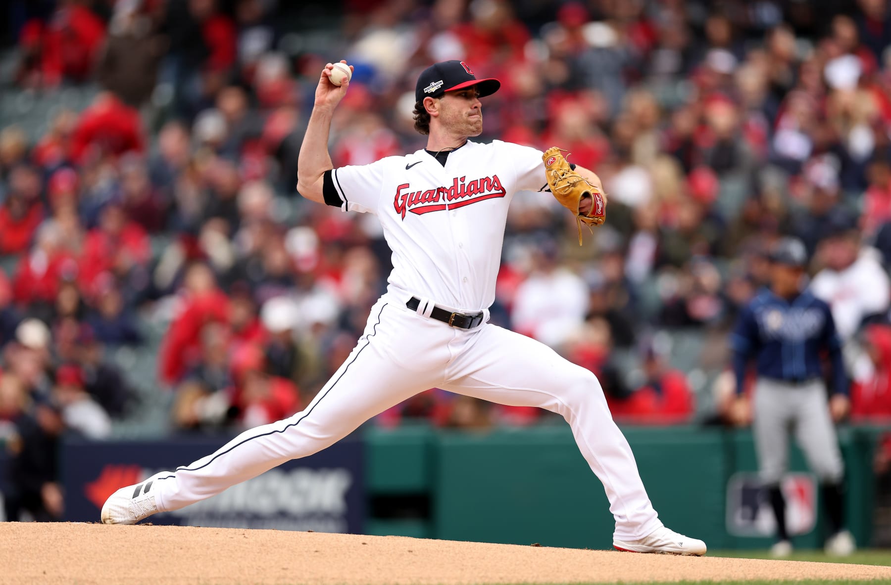 CLEVELAND, OHIO - OCTOBER 07:   Shane Bieber #57 of the Cleveland Guardians throws a pitch in the first inning against the the Tampa Bay Rays during game one of the Wild Card Series at Progressive Field on October 07, 2022 in Cleveland, Ohio. (Photo by Matthew Stockman/Getty Images)