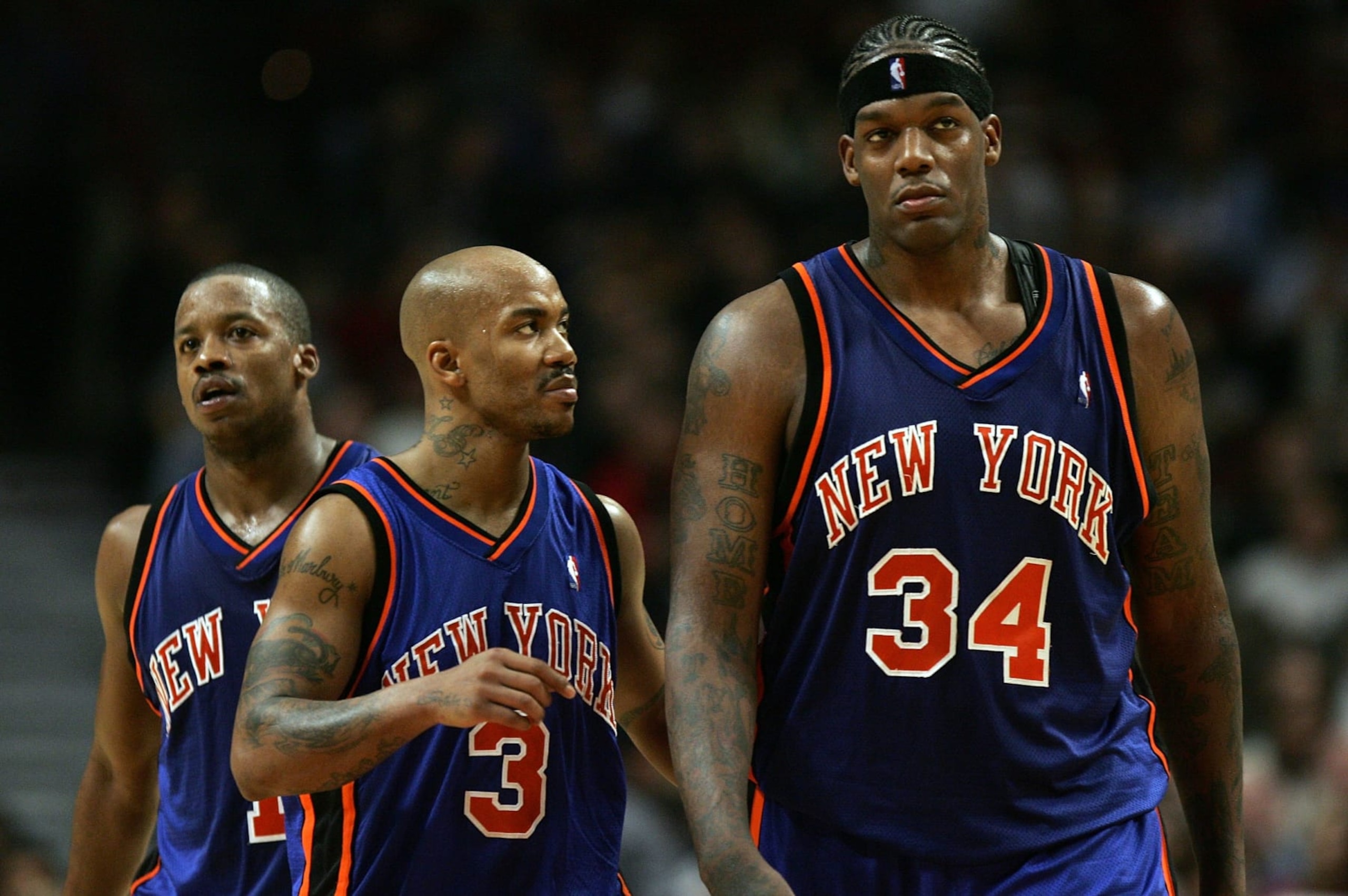 CHICAGO - NOVEMBER 28:  (L-R) Steve Francis #1, Stephon Marbury #3 and Eddy Curry #34 of the New York Knicks walk up court against the Chicago Bulls November 28, 2006 at the United Center in Chicago, Illinois.  NOTE TO USER: User expressly acknowledges and agrees that, by downloading and or using this photograph, user is consenting to the terms and conditions of Getty Images License Agreement. Seen behind Marbury and Curry is Steve Francis #1 of the Knicks.  (Photo by Jonathan Daniel/Getty Images)