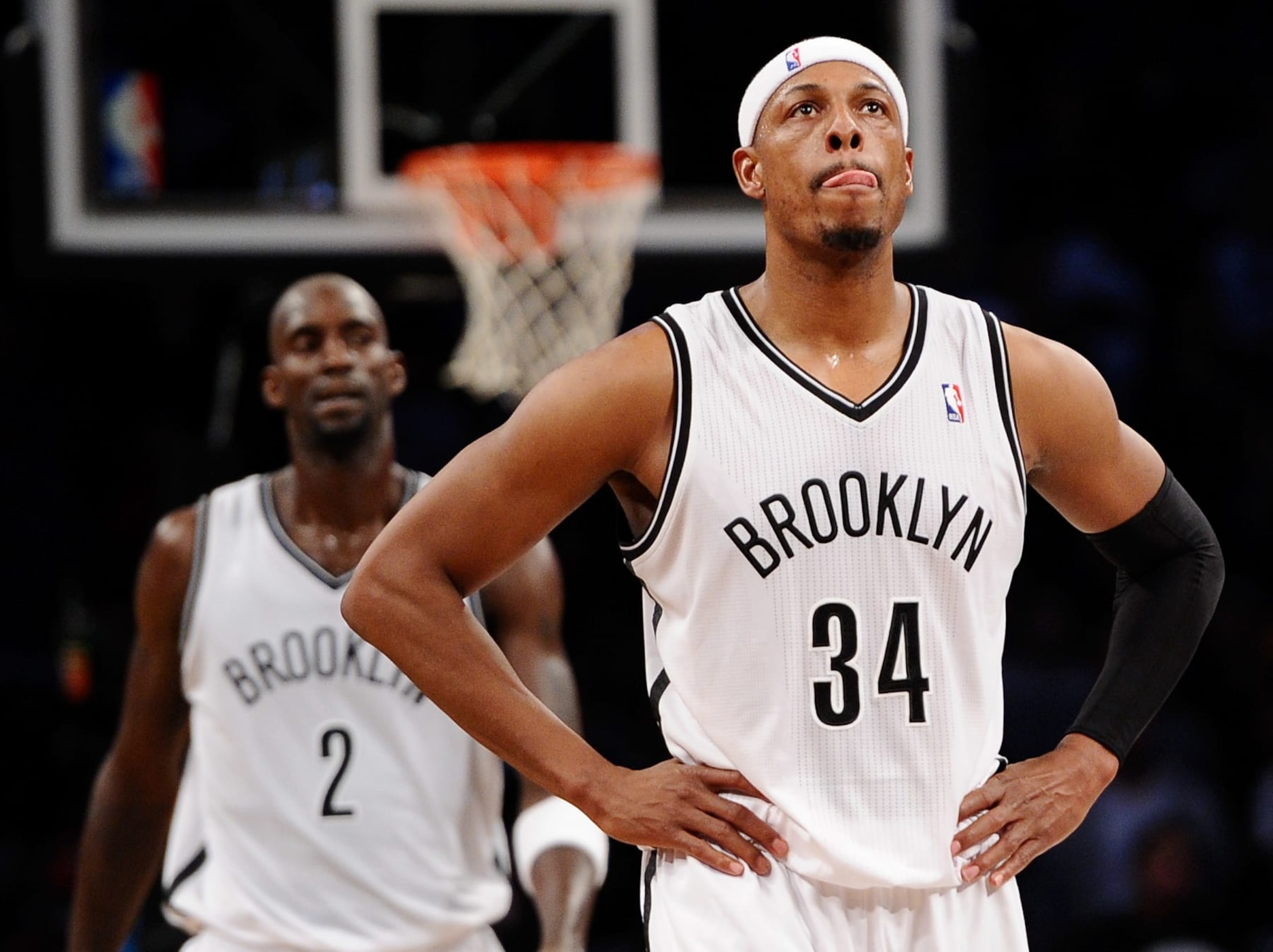 NEW YORK, NY - NOVEMBER 09:  Paul Pierce #34 of the Brooklyn Nets walks downcourt in front of Kevin Garnett #2 during the fourth quarter against the Indiana Pacers at Barclays Center on November 9, 2013 in the Brooklyn borough of New York City. The Pacers defeat the Nets 96-91. NOTE TO USER: User expressly acknowledges and agrees that, by downloading and/or using this photograph, user is consenting to the terms and conditions of the Getty Images License Agreement. (Photo by Maddie Meyer/Getty Images)