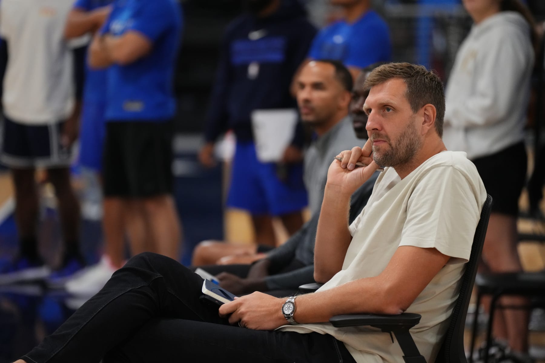 DALLAS, TX - SEPTEMBER 30: Retired Dallas Maverick Dirk Nowitzki watches during practice on September 30, 2022 at the Dallas Mavericks Practice Facility in Dallas, Texas. NOTE TO USER: User expressly acknowledges and agrees that, by downloading and or using this photograph, User is consenting to the terms and conditions of the Getty Images License Agreement. Mandatory Copyright Notice: Copyright 2022 NBAE (Photo by Cooper Neill/NBAE via Getty Images)