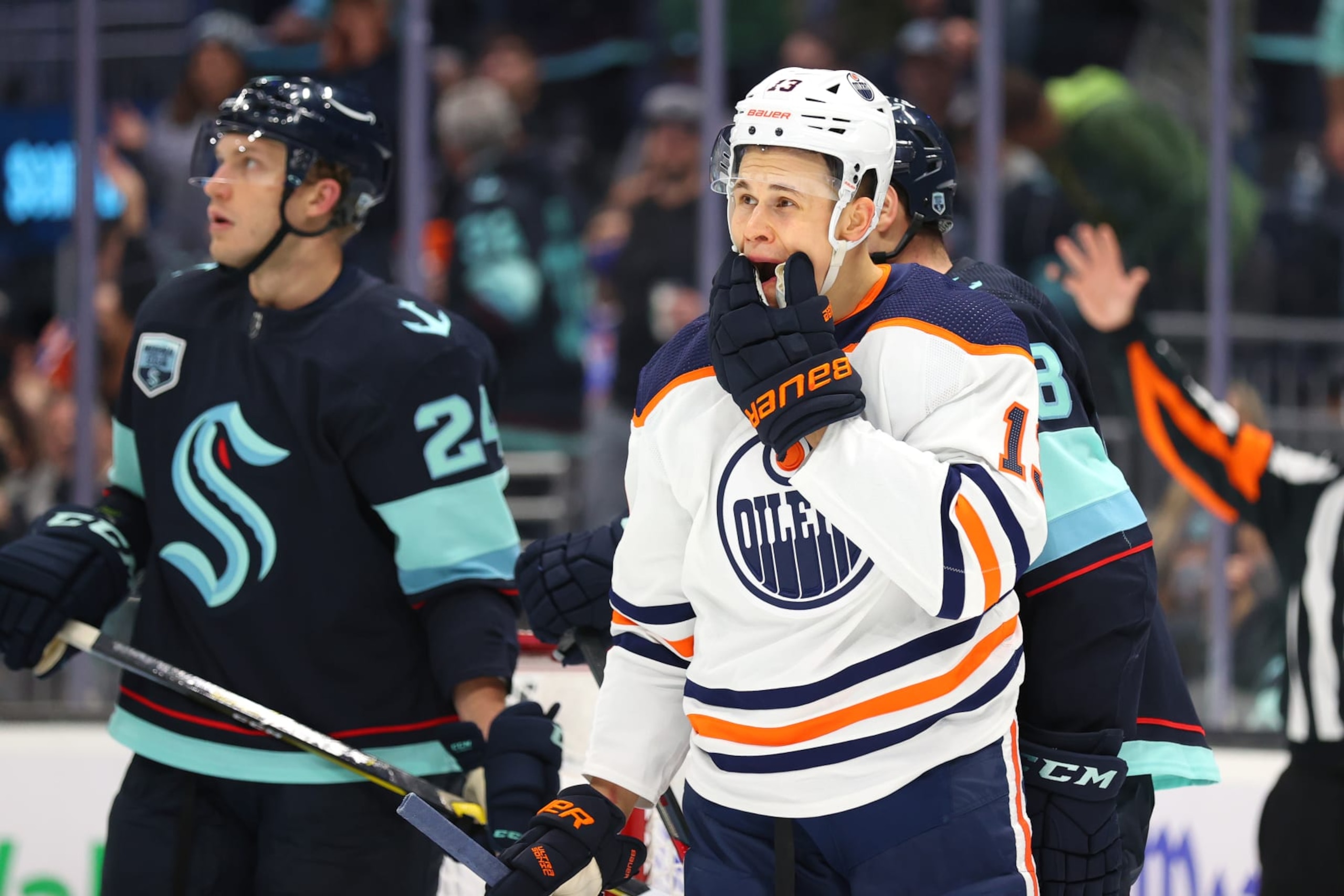SEATTLE, WASHINGTON - DECEMBER 03: Jesse Puljujarvi #13 of the Edmonton Oilers reacts after a missed goal opportunity during third period against the Seattle Kraken at Climate Pledge Arena on December 03, 2021 in Seattle, Washington. (Photo by Abbie Parr/NHLI via Getty Images)