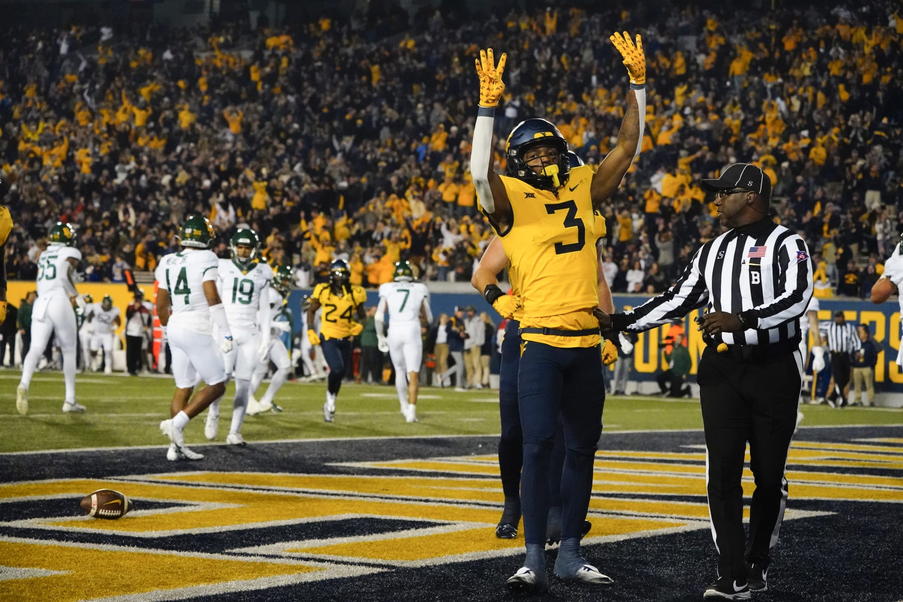 MORGANTOWN, WV - OCTOBER 13: West Virginia Mountaineers Wide Receiver Kaden Prather (3) reacts to scoring a touchdown during the second half of the college football game between the Baylor Bears and the West Virginia Mountaineers on October 13, 2022, at Mountaineer Field at Milan Puskar Stadium in Morgantown, WV. (Photo by Gregory Fisher/Icon Sportswire via Getty Images)