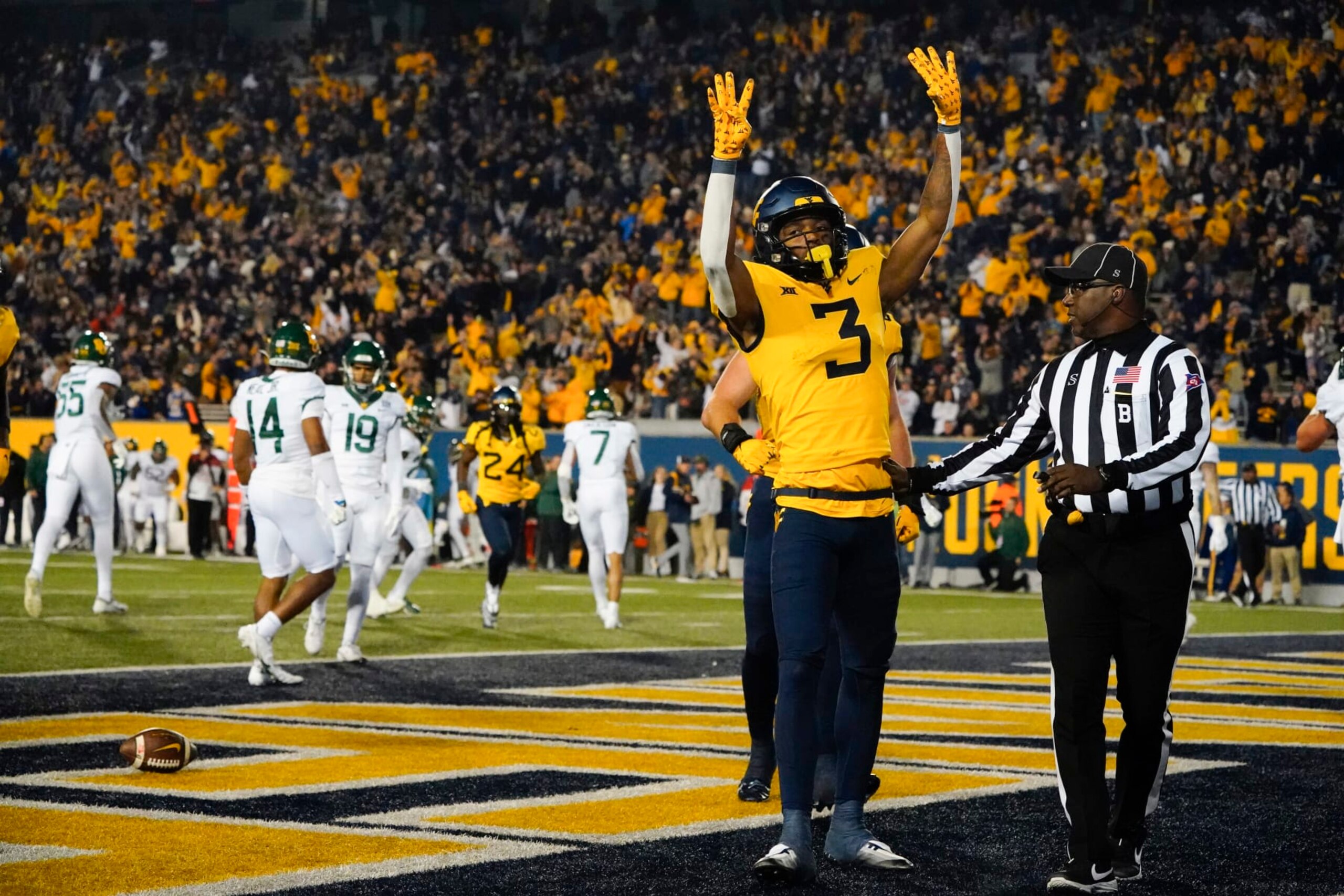 MORGANTOWN, WV - OCTOBER 13: West Virginia Mountaineers Wide Receiver Kaden Prather (3) reacts to scoring a touchdown during the second half of the college football game between the Baylor Bears and the West Virginia Mountaineers on October 13, 2022, at Mountaineer Field at Milan Puskar Stadium in Morgantown, WV. (Photo by Gregory Fisher/Icon Sportswire via Getty Images)