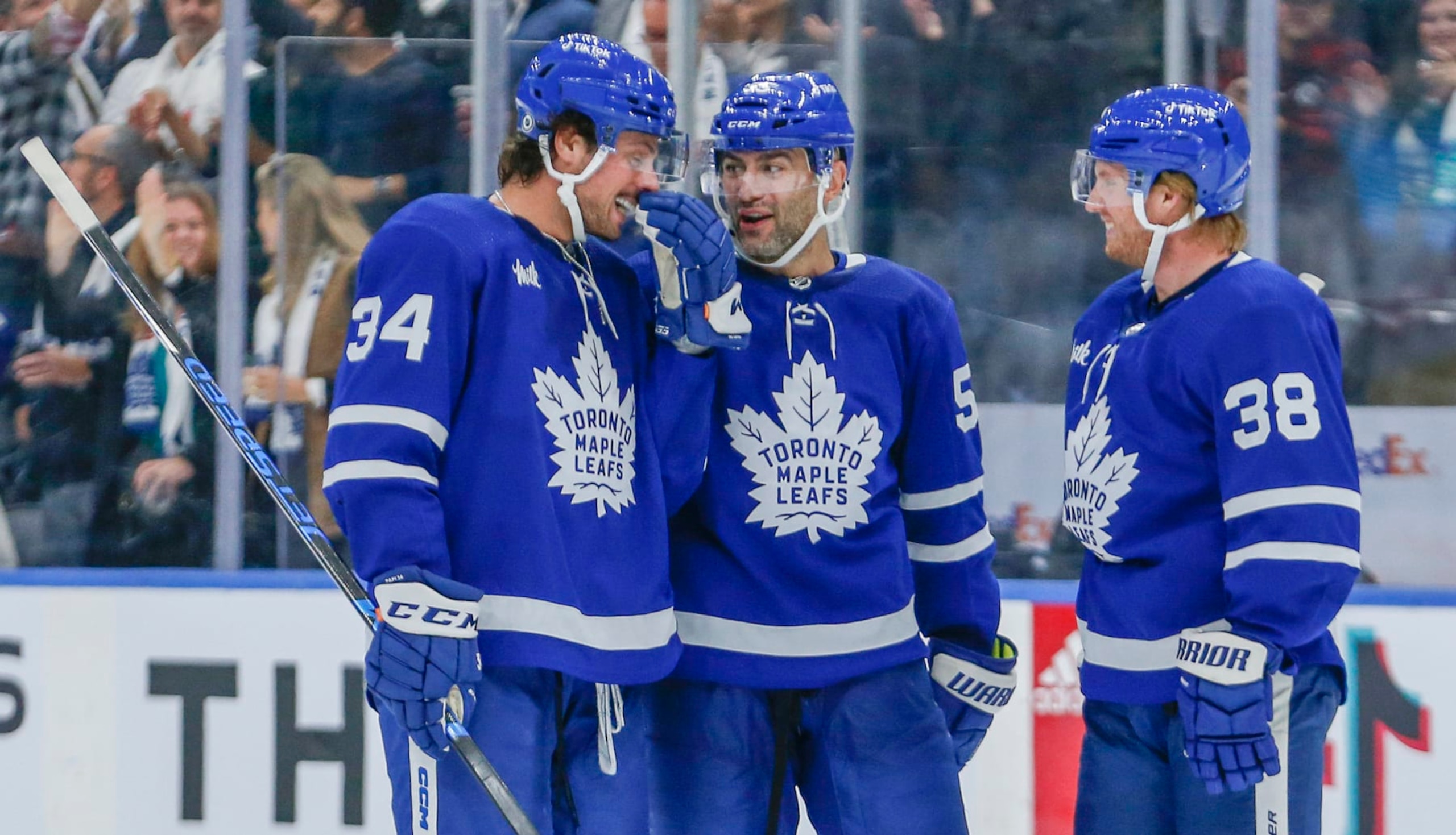 NO PHOTO CREDIT 
 NO PHOTO CREDIT 


TORONTO, ON - OCTOBER 13: Toronto Maple Leafs center Auston Matthews (34), Toronto Maple Leafs defenseman Mark Giordano (55) and Toronto Maple Leafs defenseman Rasmus Sandin (38) after Matthews goal for the Leafs third goal. Toronto Maple Leafs vs Washington Capitals during 3rd period play NHL regular season action at Scotiabank Arena in Toronto. Leafs won 3-2. Toronto Star        (Rick Madonik/Toronto Star via Getty Images)