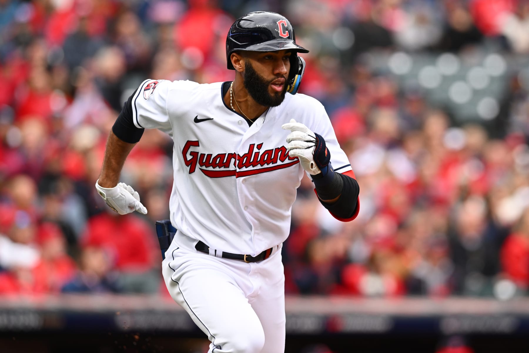 CLEVELAND, OH - OCTOBER 07: Amed Rosario #1 of the Cleveland Guardians runs to first base after hitting a single during the Wild Card Series game between the Tampa Bay Rays and the Cleveland Guardians at Progressive Field on Friday, October 7, 2022 in Cleveland, Ohio. (Photo by Ben Jackson/MLB Photos via Getty Images)