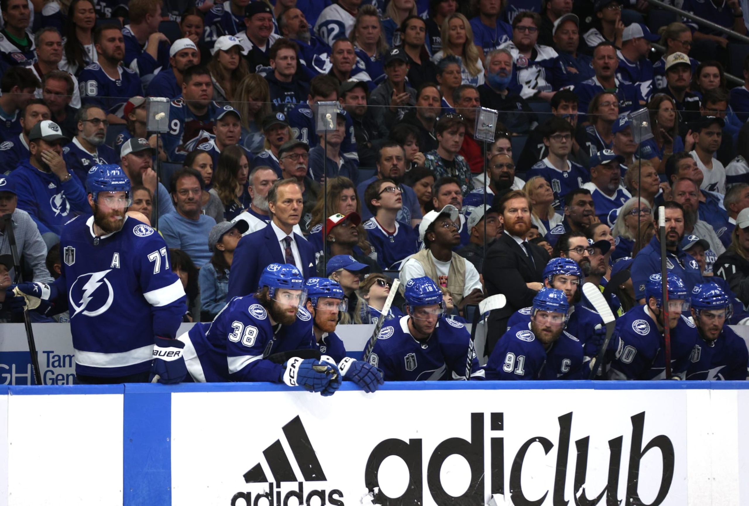 TAMPA, FLORIDA - JUNE 26: Head Coach Jon Cooper of the Tampa Bay Lightning looks on from behind his bench in the third period of Game Six of the 2022 Stanley Cup Final between the Colorado Avalanche and the Tampa Bay Lightning at Amalie Arena on June 26, 2022 in Tampa, Florida. (Photo by Dave Sandford/NHLI via Getty Images)