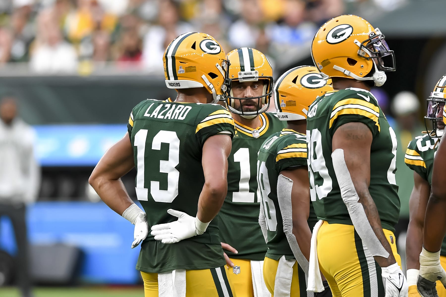 LONDON, ENGLAND - OCTOBER 09: Allen Lazard of Green Bay Packers and Aaron Rodgers of Green Bay Packers talk to each other during the NFL match between New York Giants and Green Bay Packers at Tottenham Hotspur Stadium on October 9, 2022 in London, England. (Photo by Vincent Mignott/DeFodi Images via Getty Images)