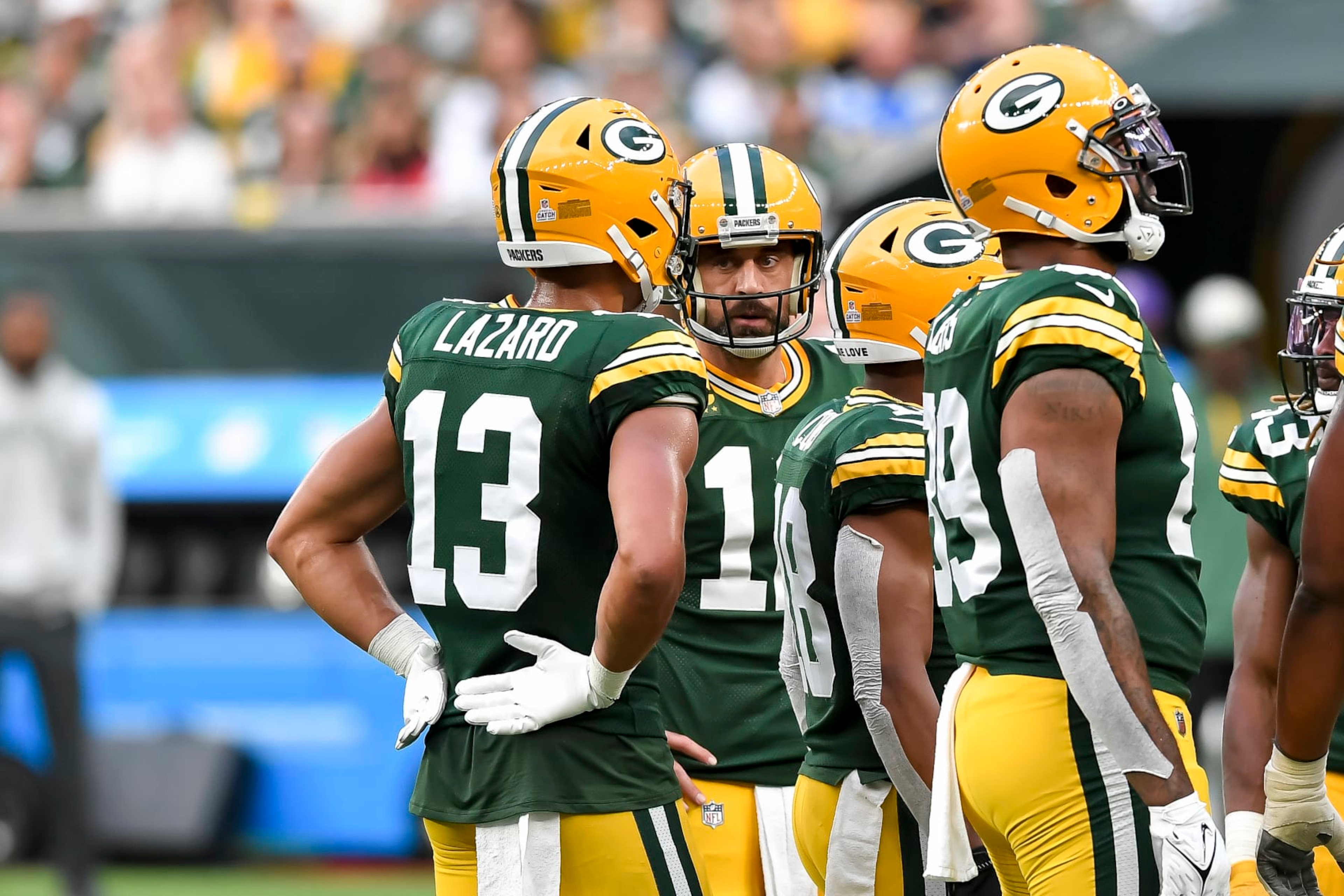 LONDON, ENGLAND - OCTOBER 09: Allen Lazard of Green Bay Packers and Aaron Rodgers of Green Bay Packers talk to each other during the NFL match between New York Giants and Green Bay Packers at Tottenham Hotspur Stadium on October 9, 2022 in London, England. (Photo by Vincent Mignott/DeFodi Images via Getty Images) LONDON, ENGLAND - OCTOBER 09: Allen Lazard of Green Bay Packers and Aaron Rodgers of Green Bay Packers talk to each other during the NFL match between New York Giants and Green Bay Packers at Tottenham Hotspur Stadium on October 9, 2022 in London, England. (Photo by Vincent Mignott/DeFodi Images via Getty Images)