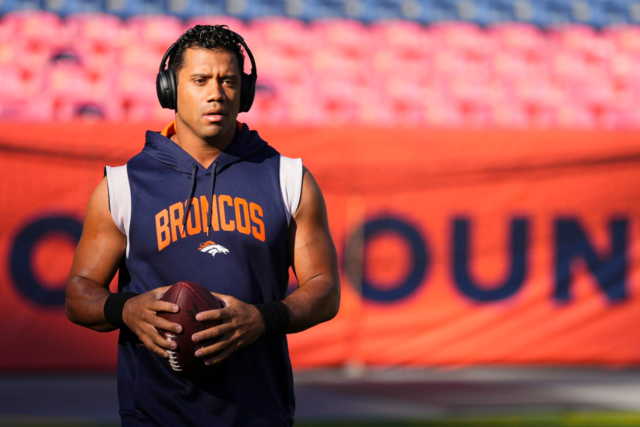 DENVER, CO - OCTOBER 06: Russell Wilson #3 of the Denver Broncos warms up against the Indianapolis Colts at Empower Field at Mile High on October 6, 2022 in Denver, Texas. (Photo by Cooper Neill/Getty Images)