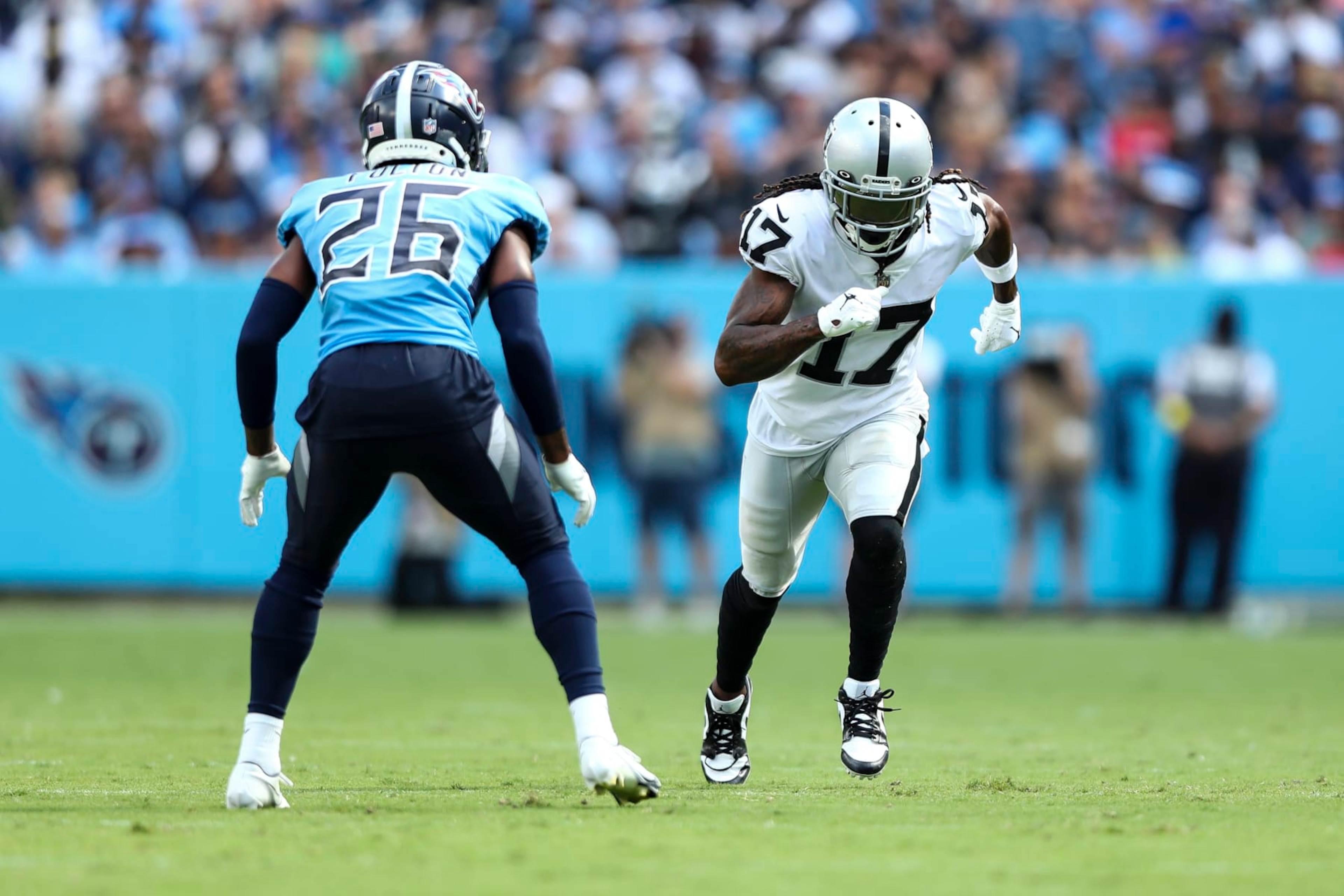 NASHVILLE, TN - SEPTEMBER 25: Davante Adams #17 of the Las Vegas Raiders runs downfield during an NFL football game against the Tennessee Titans at Nissan Stadium on September 25, 2022 in Nashville, Tennessee. (Photo by Kevin Sabitus/Getty Images) NASHVILLE, TN - SEPTEMBER 25: Davante Adams #17 of the Las Vegas Raiders runs downfield during an NFL football game against the Tennessee Titans at Nissan Stadium on September 25, 2022 in Nashville, Tennessee. (Photo by Kevin Sabitus/Getty Images)