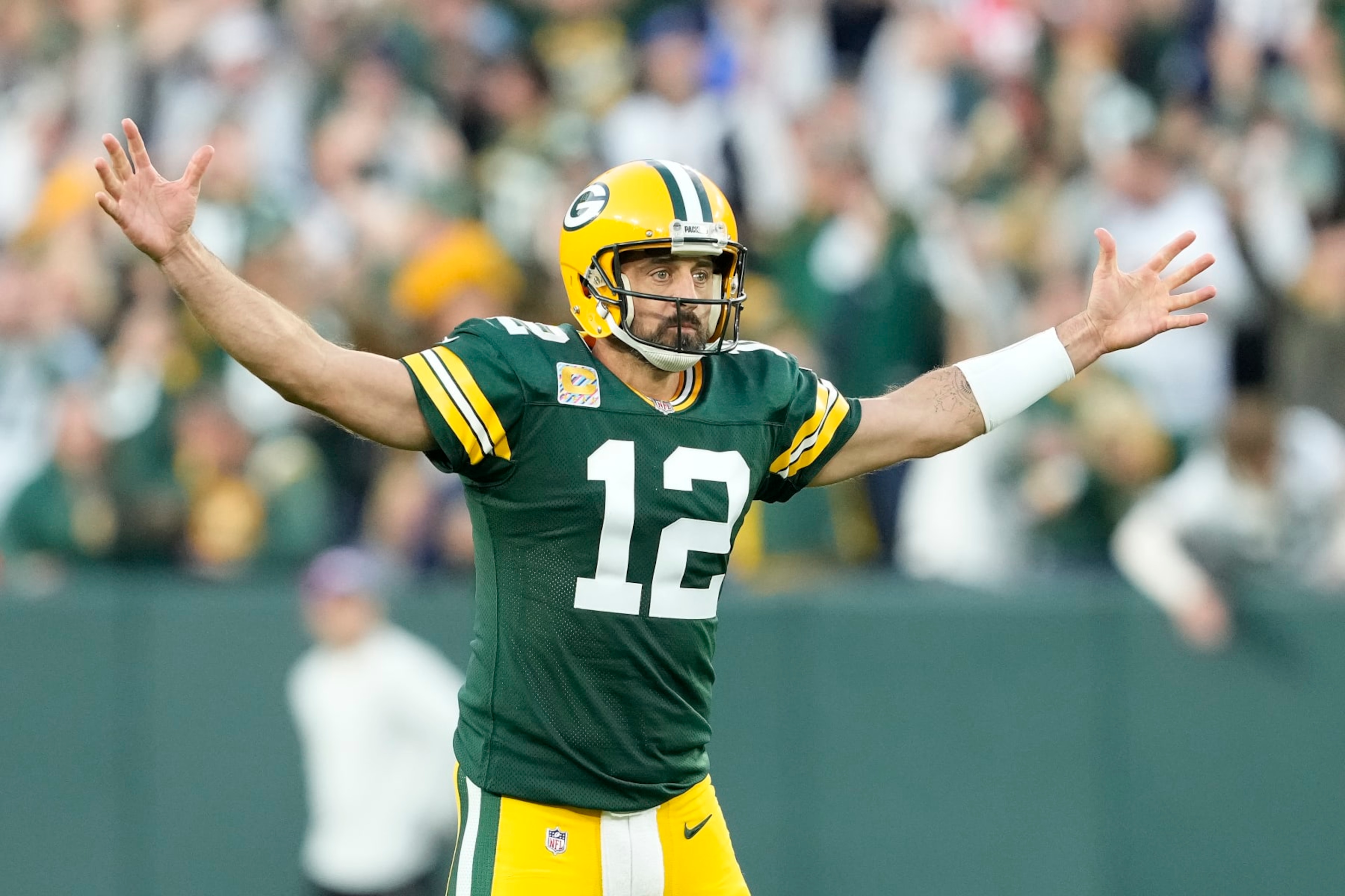 GREEN BAY, WISCONSIN - OCTOBER 02: Aaron Rodgers #12 of the Green Bay Packers reacts after a play in the second half against the New England Patriots at Lambeau Field on October 02, 2022 in Green Bay, Wisconsin. (Photo by Patrick McDermott/Getty Images) GREEN BAY, WISCONSIN - OCTOBER 02: Aaron Rodgers #12 of the Green Bay Packers reacts after a play in the second half against the New England Patriots at Lambeau Field on October 02, 2022 in Green Bay, Wisconsin. (Photo by Patrick McDermott/Getty Images)