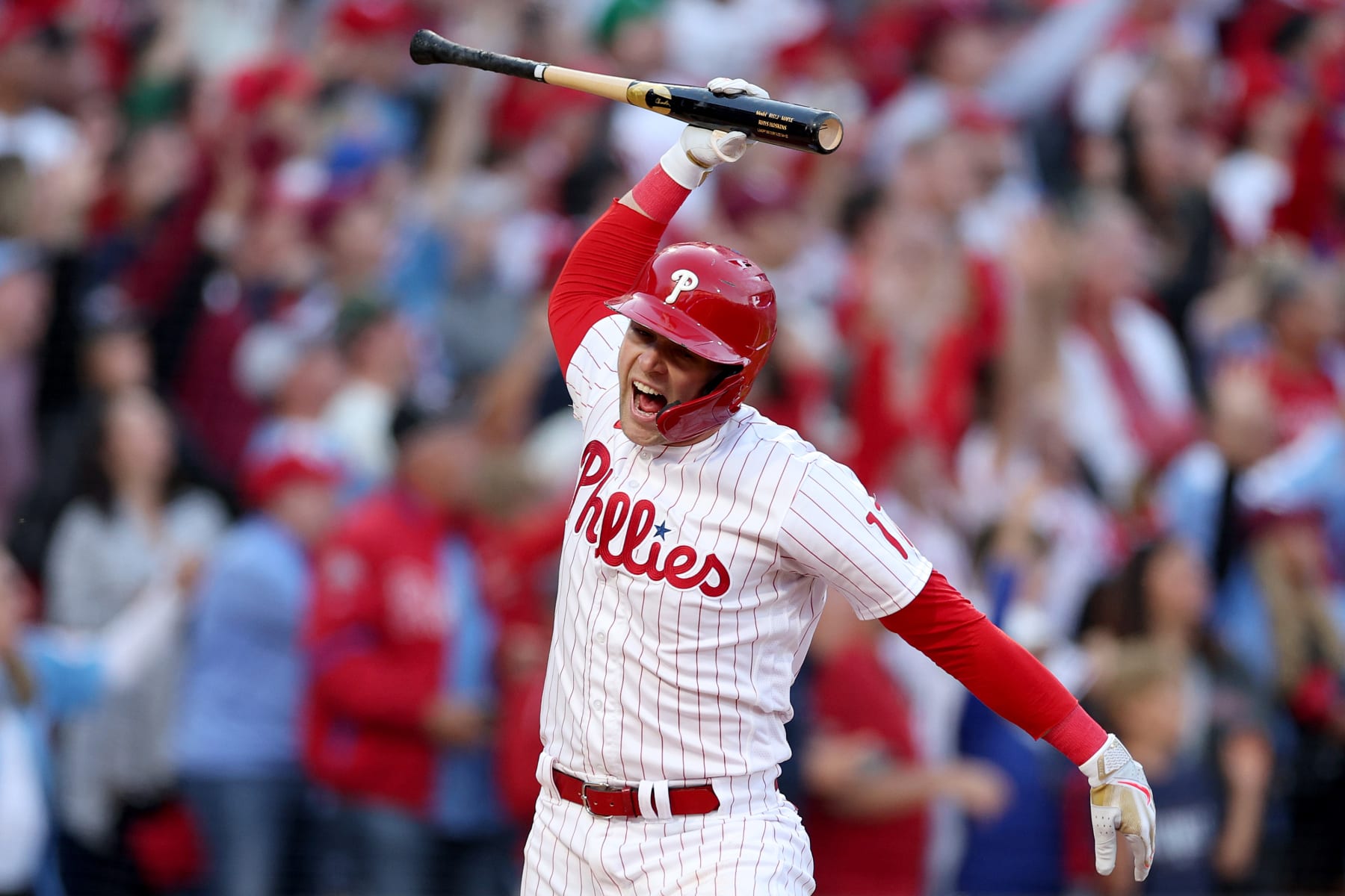 PHILADELPHIA, PENNSYLVANIA - OCTOBER 14: Rhys Hoskins #17 of the Philadelphia Phillies celebrates after hitting a three run home run against Spencer Strider #65 of the Atlanta Braves during the third inning in game three of the National League Division Series at Citizens Bank Park on October 14, 2022 in Philadelphia, Pennsylvania. (Photo by Patrick Smith/Getty Images)