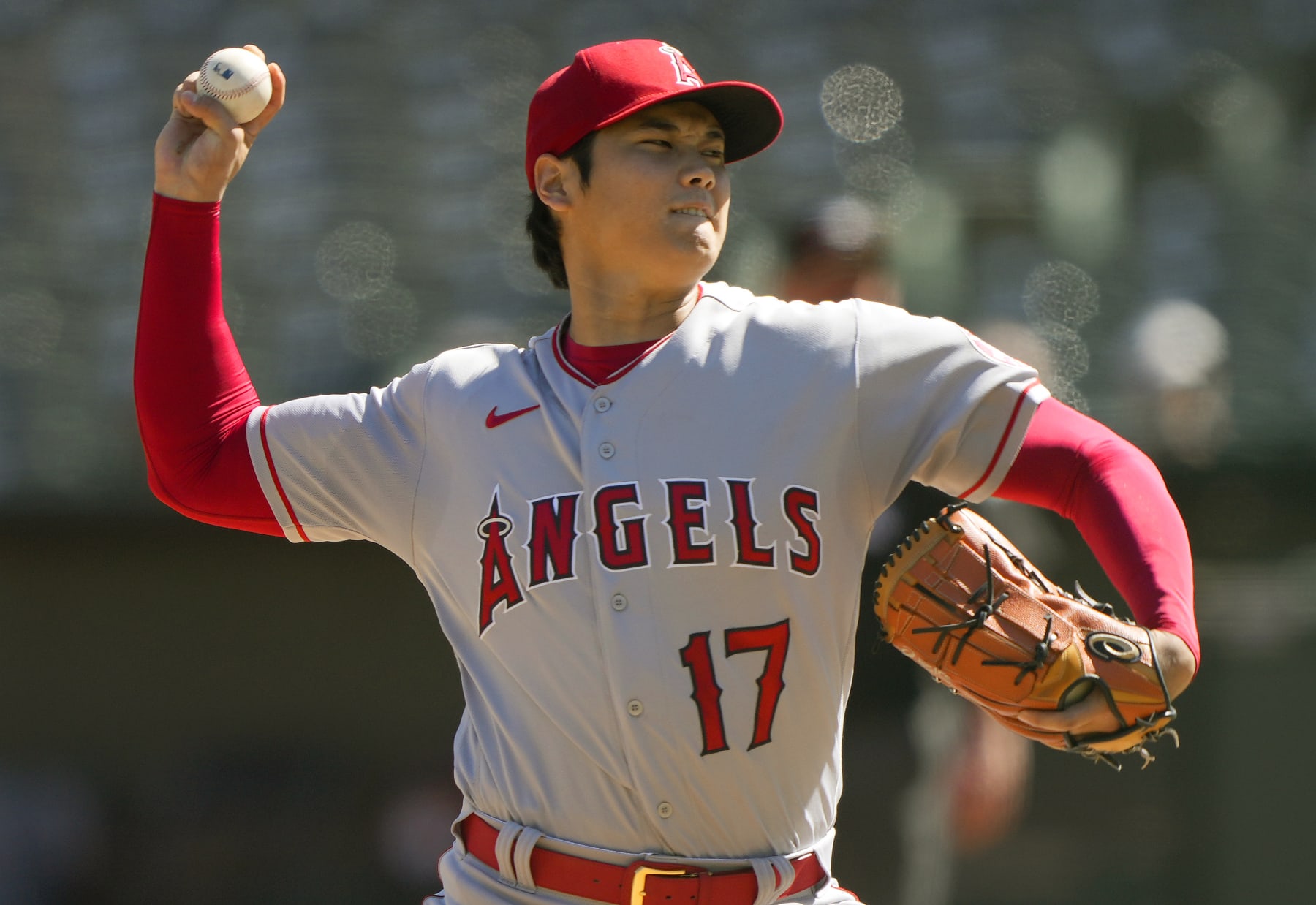 OAKLAND, CALIFORNIA - OCTOBER 05: Shohei Ohtani #17 of the Los Angeles Angels pitches against the Oakland Athletics in the bottom of the first inning at RingCentral Coliseum on October 05, 2022 in Oakland, California. (Photo by Thearon W. Henderson/Getty Images)