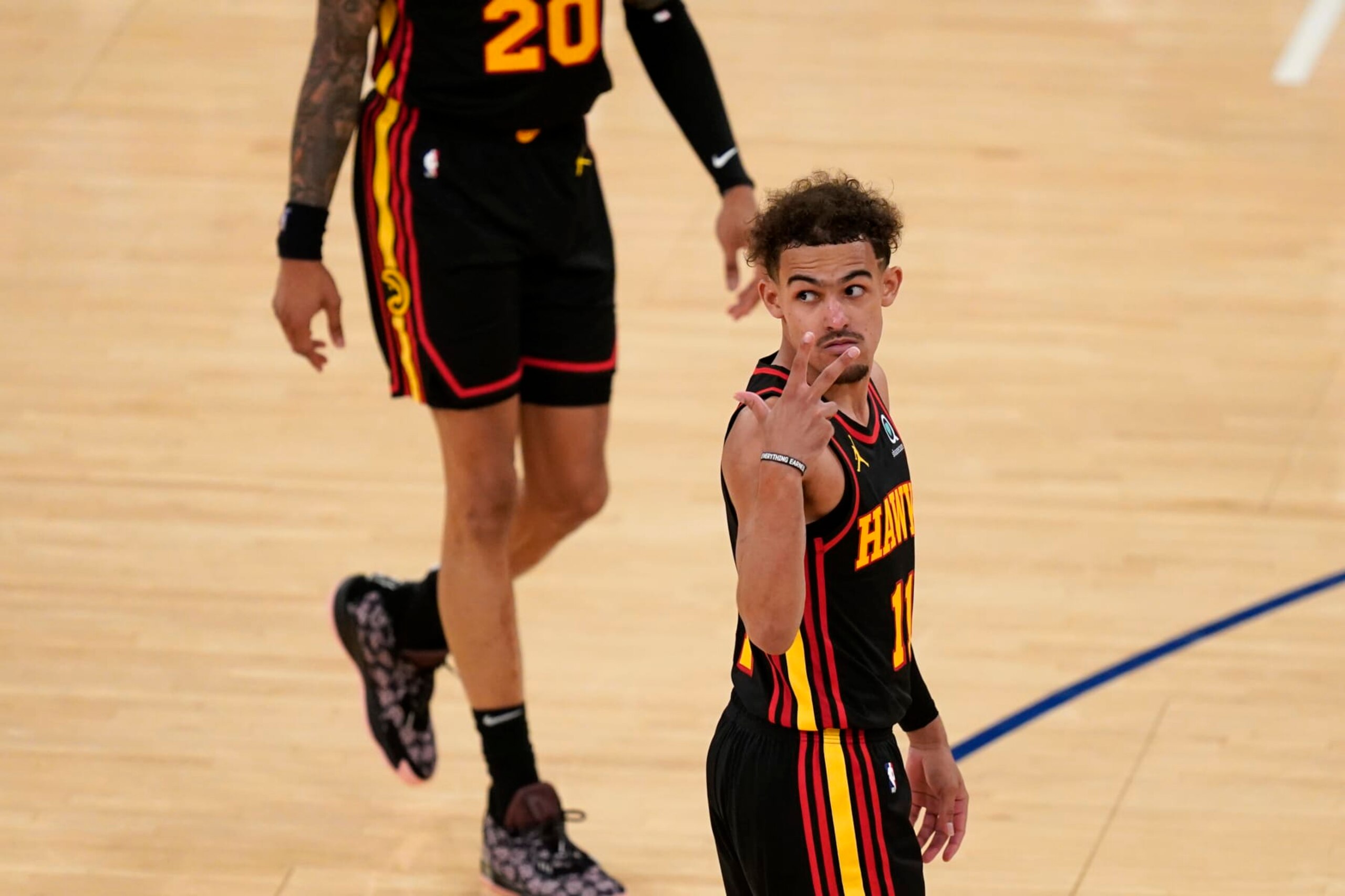 NEW YORK, NY - MAY 23: Atlanta Hawks' Trae Young gestures during the second half of Game 1 of an NBA basketball first-round playoff series against the New York Knicks on May 23, 2021 in New York City. NOTE TO USER: User expressly acknowledges and agrees that,  by downloading and or using this photograph,  User is consenting to the terms and conditions of the Getty Images License Agreement. (Photo by Seth Wenig - Pool/Getty Images)