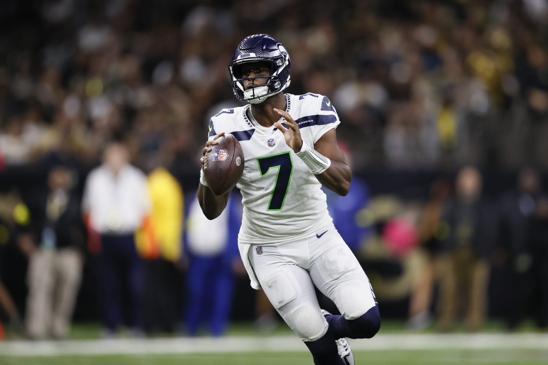 Seattle Seahawks quarterback Geno Smith (7) plays against the New Orleans Saints during an NFL football game in New Orleans, Sunday, Oct. 9, 2022. (AP Photo/Derick Hingle)